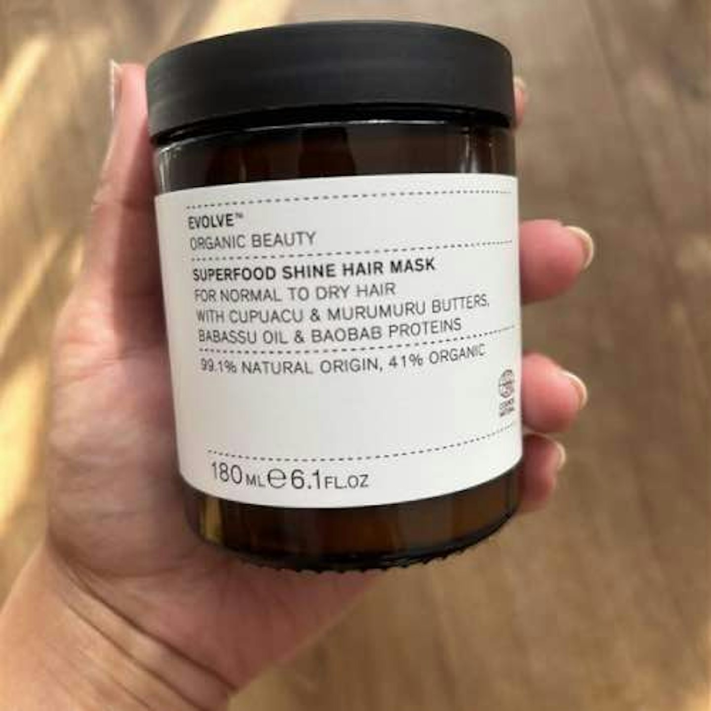 Evolve Hair mask brown jar in hand 