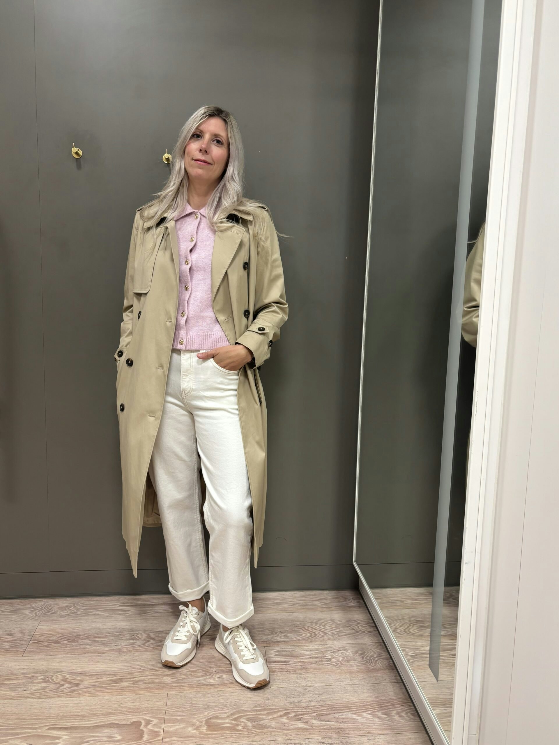 Claire styling a trench coat with jeans