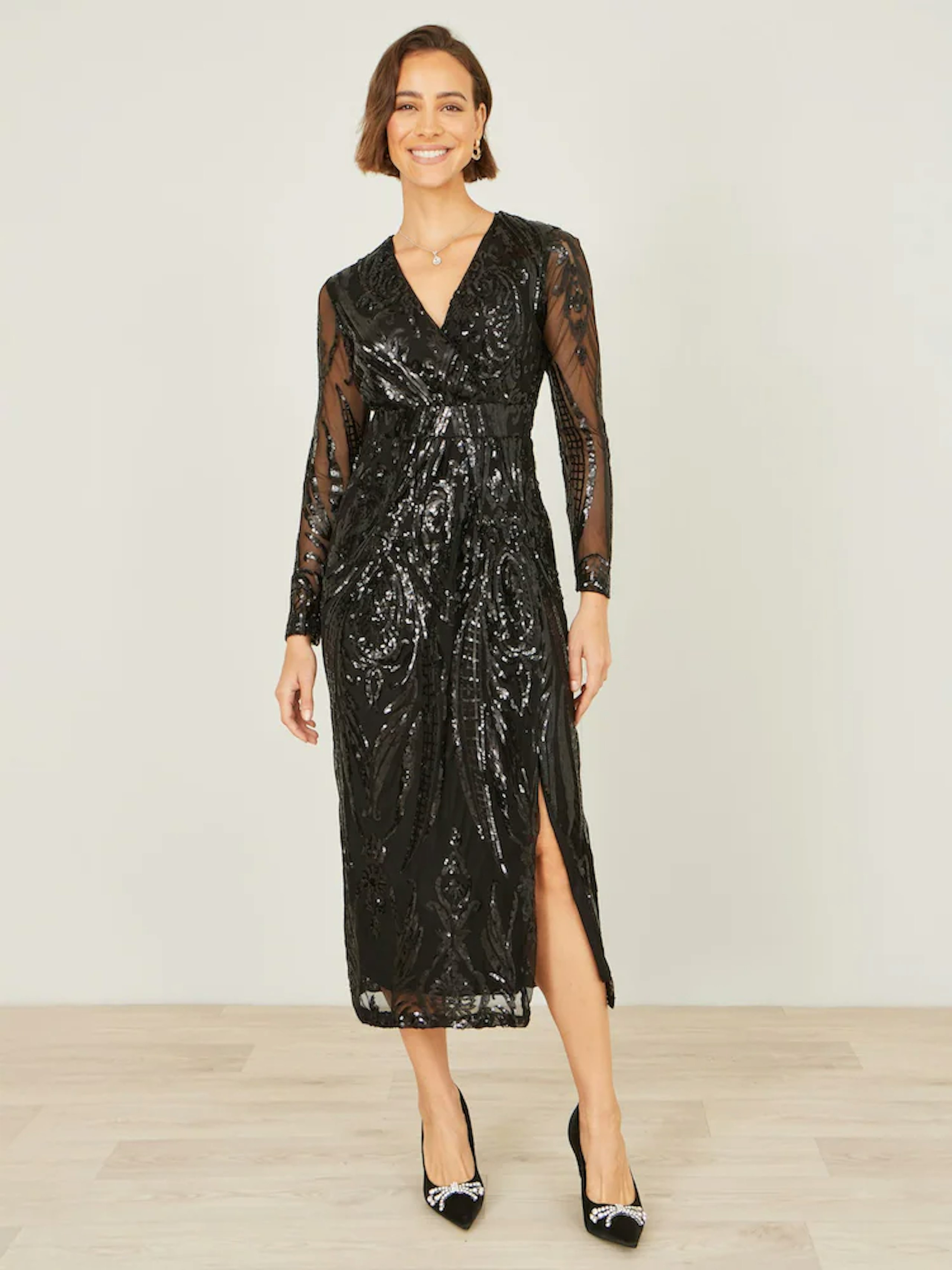 Image of the Yumi Black Sequin Midi Wrap Dress With Split Hemline And Long Sleeves