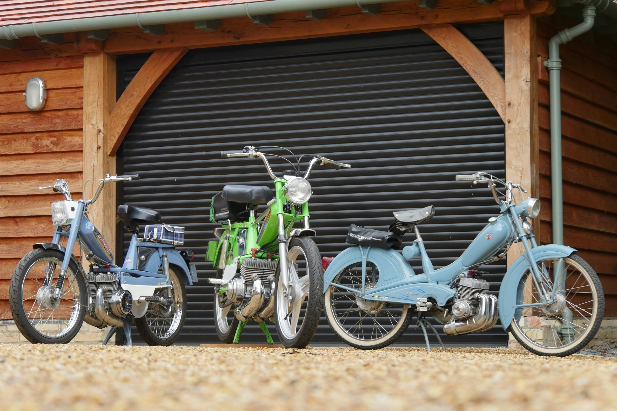 three of Bill Gysin's bikes lined up outside