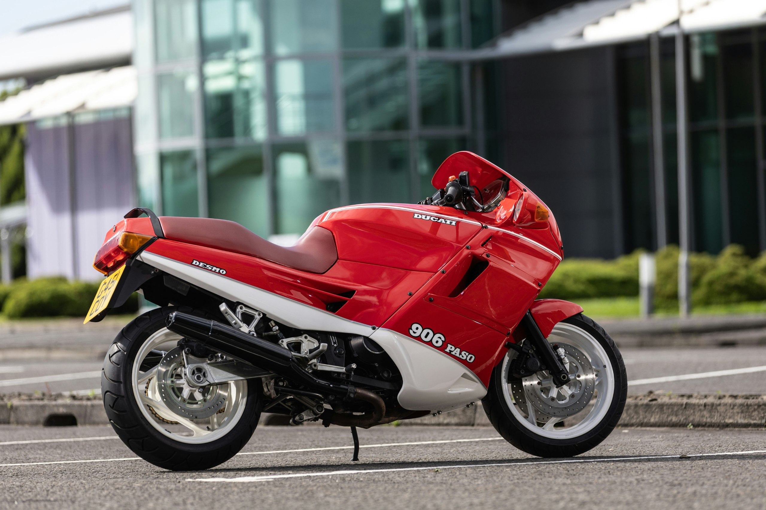 A red Ducati 906 Paso parked up