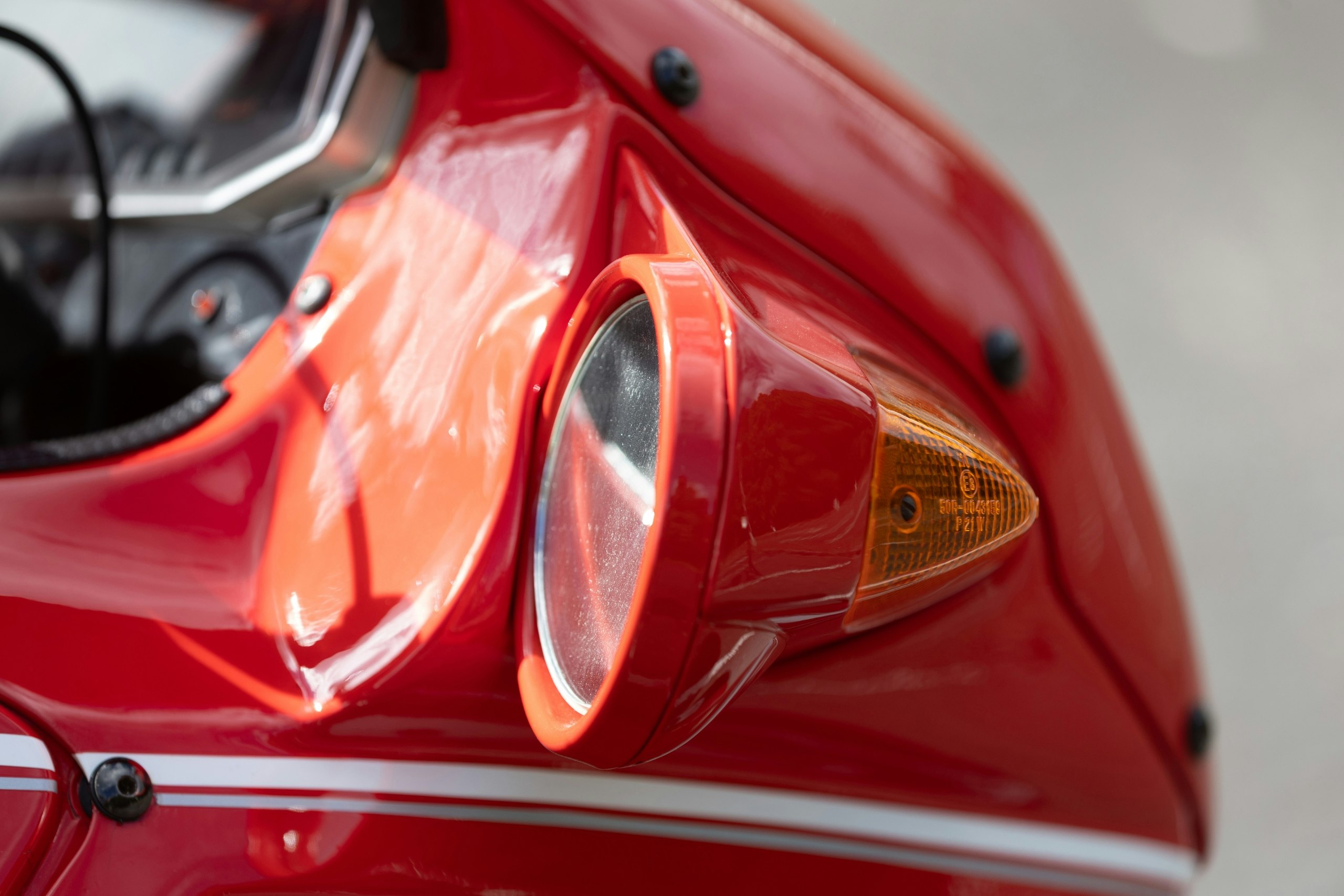 A close up of the fairing-mounted mirrors on the Ducati 906 Paso