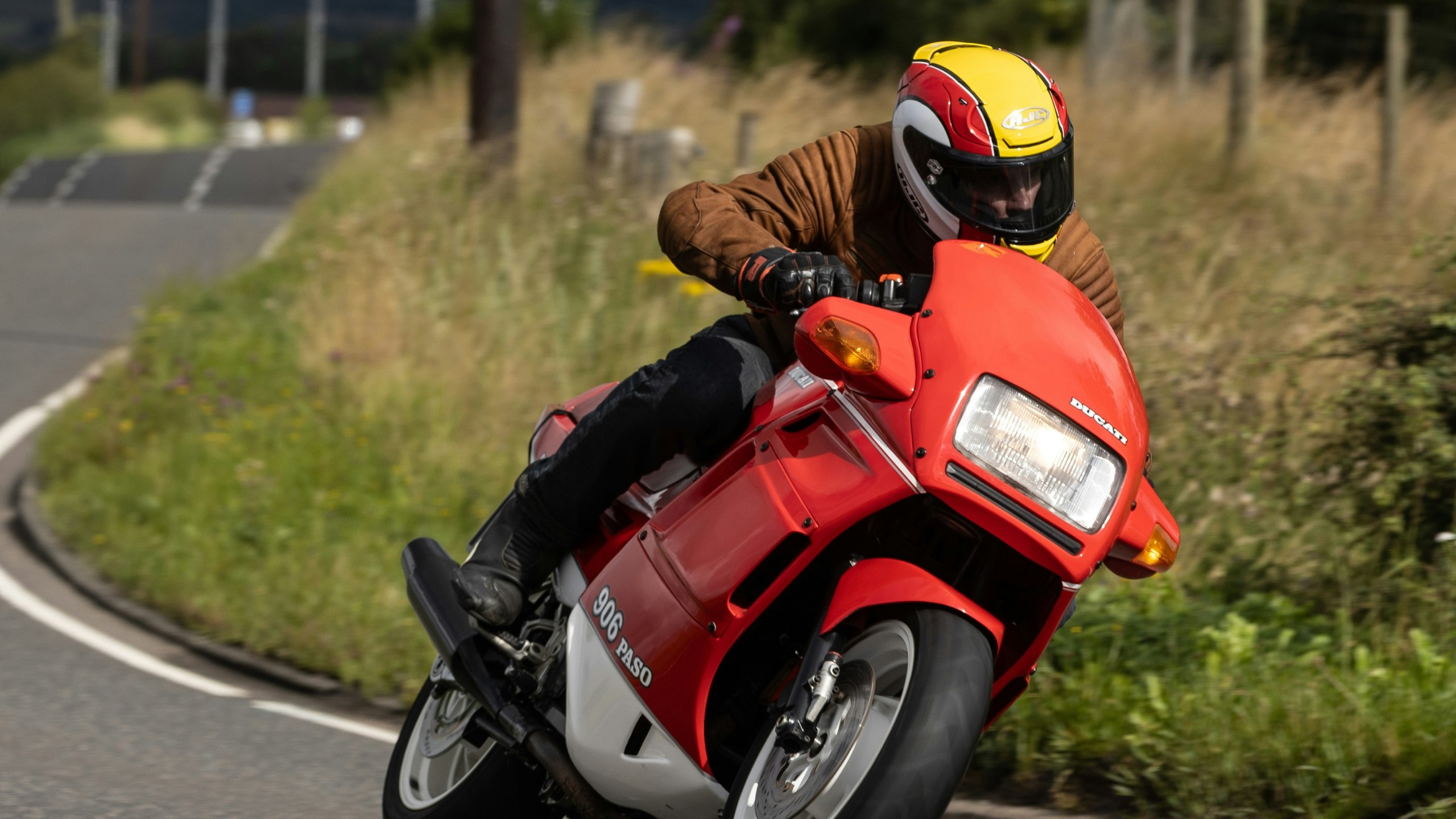 A Ducati 906 Paso being ridden on the road