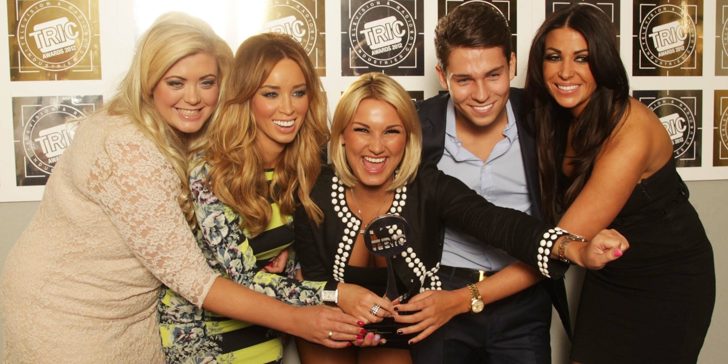 Gemma Collins, Lauren Pope, Sam Faiers, Joey Essex and Cara Kilbey of The Only Way Is Essex pose holding an award