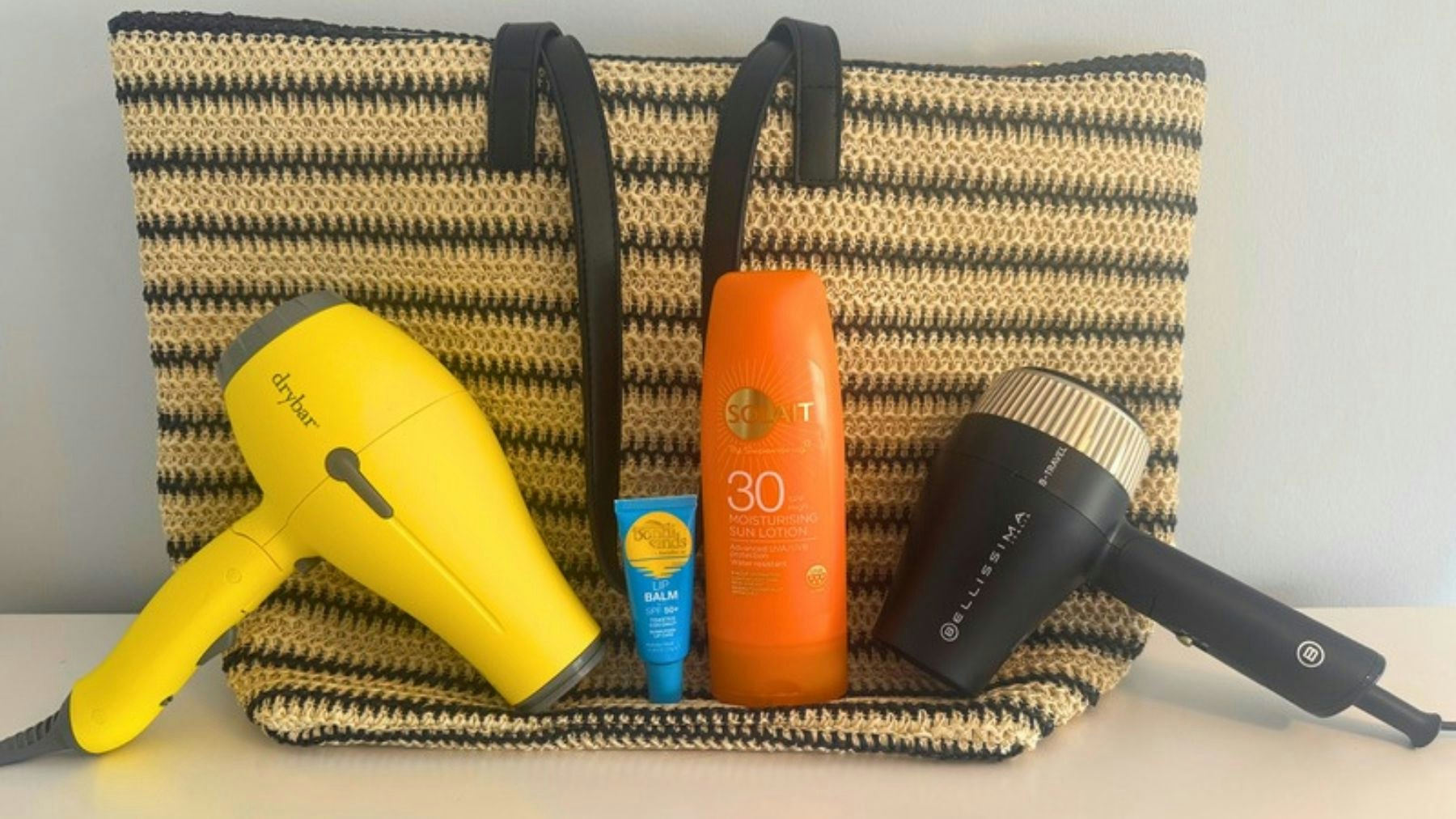 A selection of the best travel hair dryers tested for Closer Online by Rosie Floyd