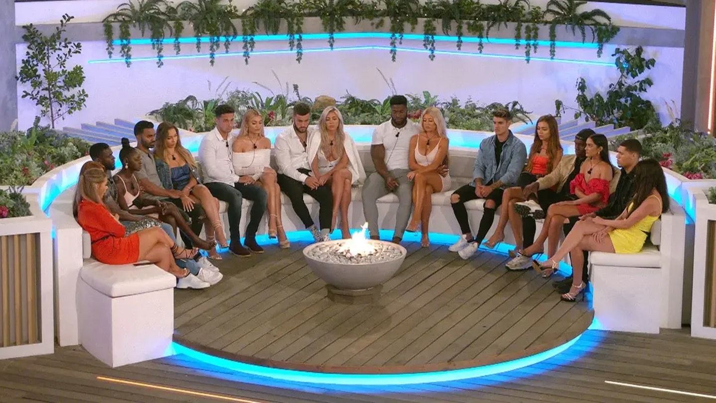Love Island 2020 cast sat around the fire pit in the villa