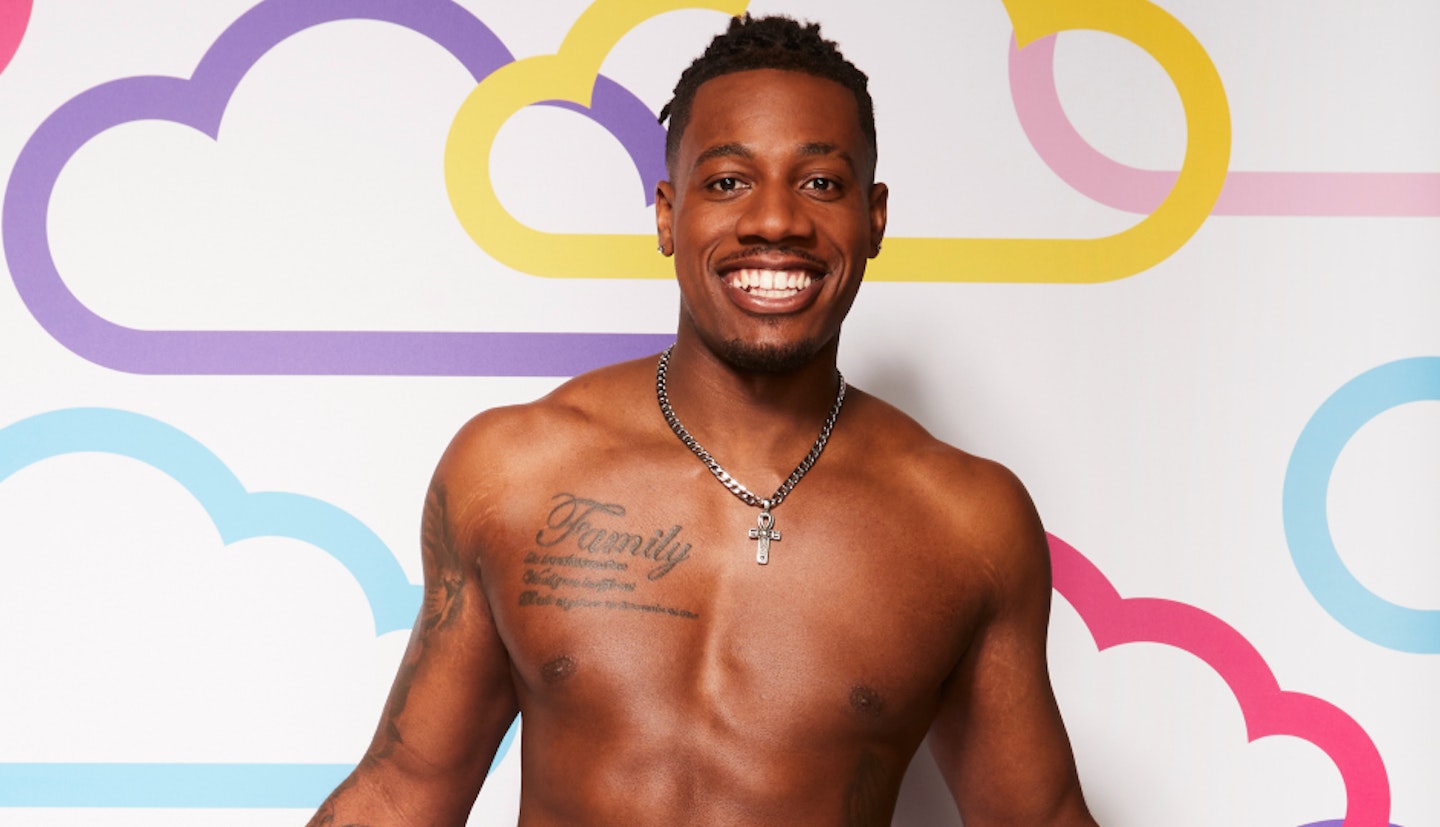 Love Island's Shaq Muhammad posing against a white background with multi-coloured clouds