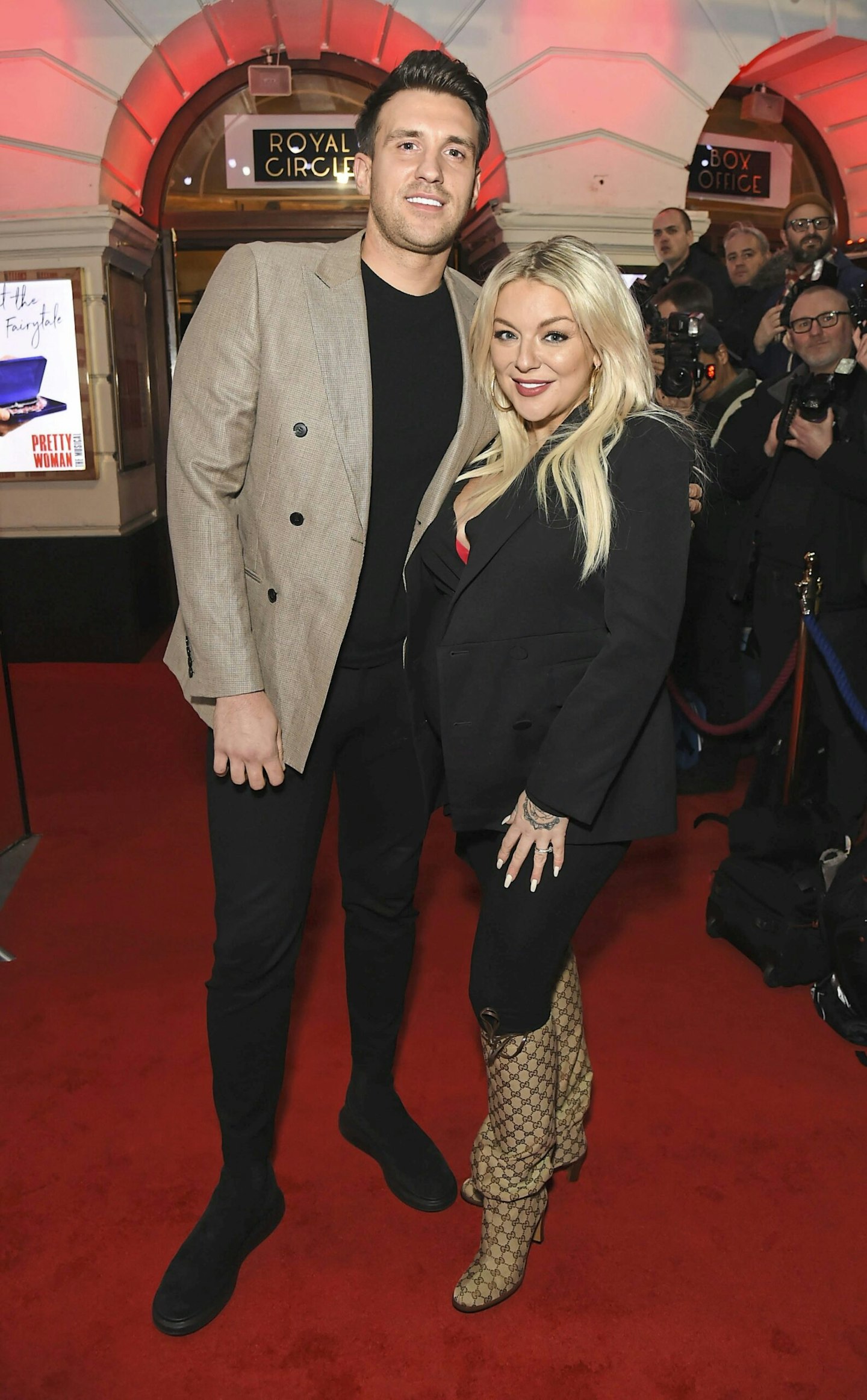 sheridan smith and jamie horn on a red carpet