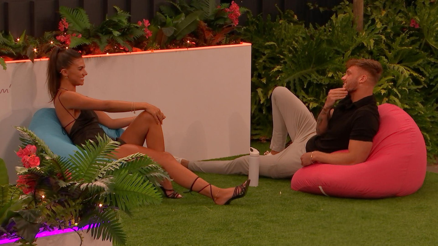 Samie and ryan chat on the beanbags