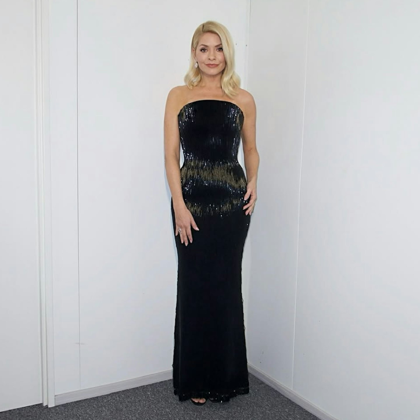 Holly wearing a black gown
