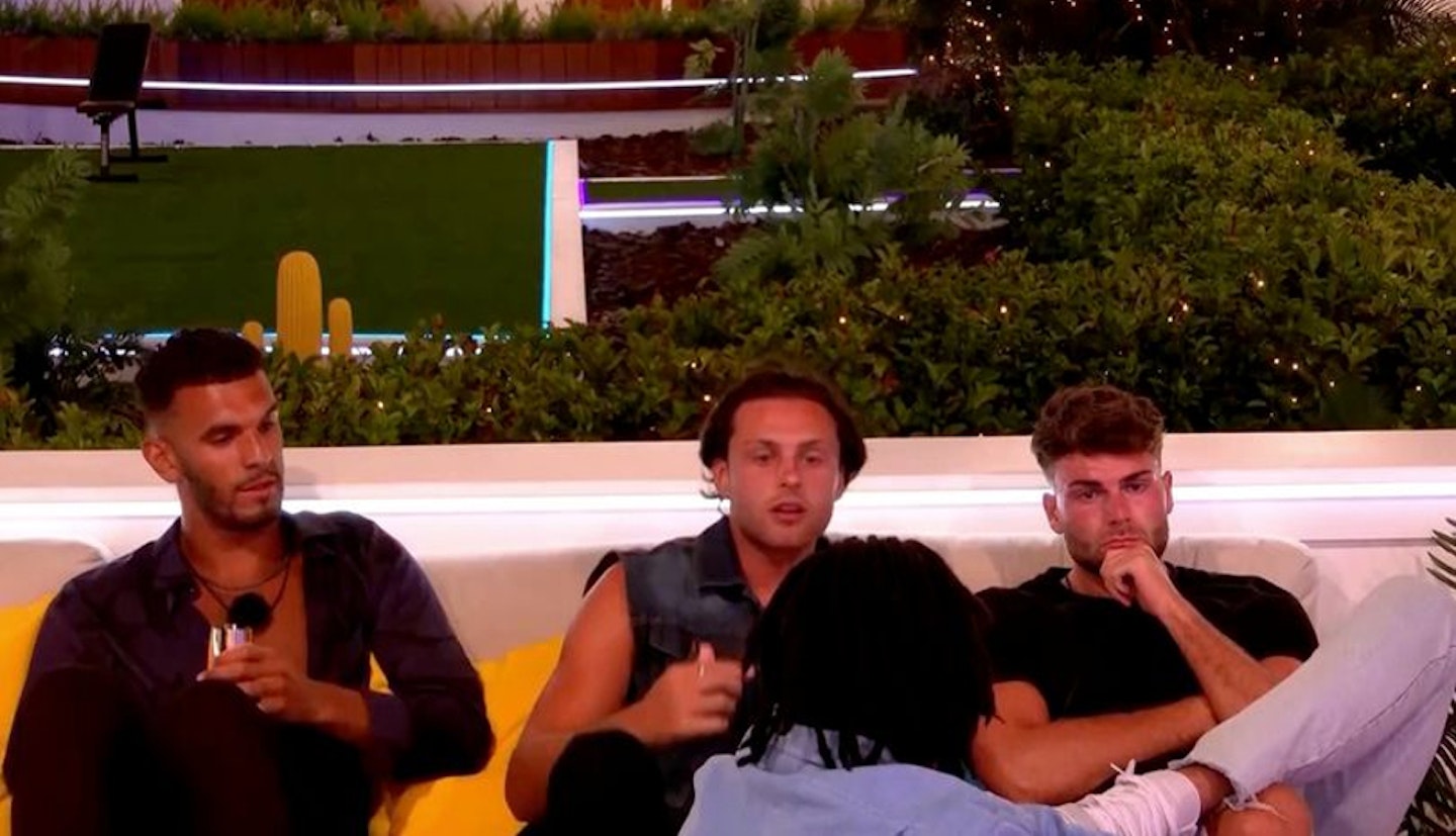 Kai, Casey and Tom sitting on the terrace on Love Island