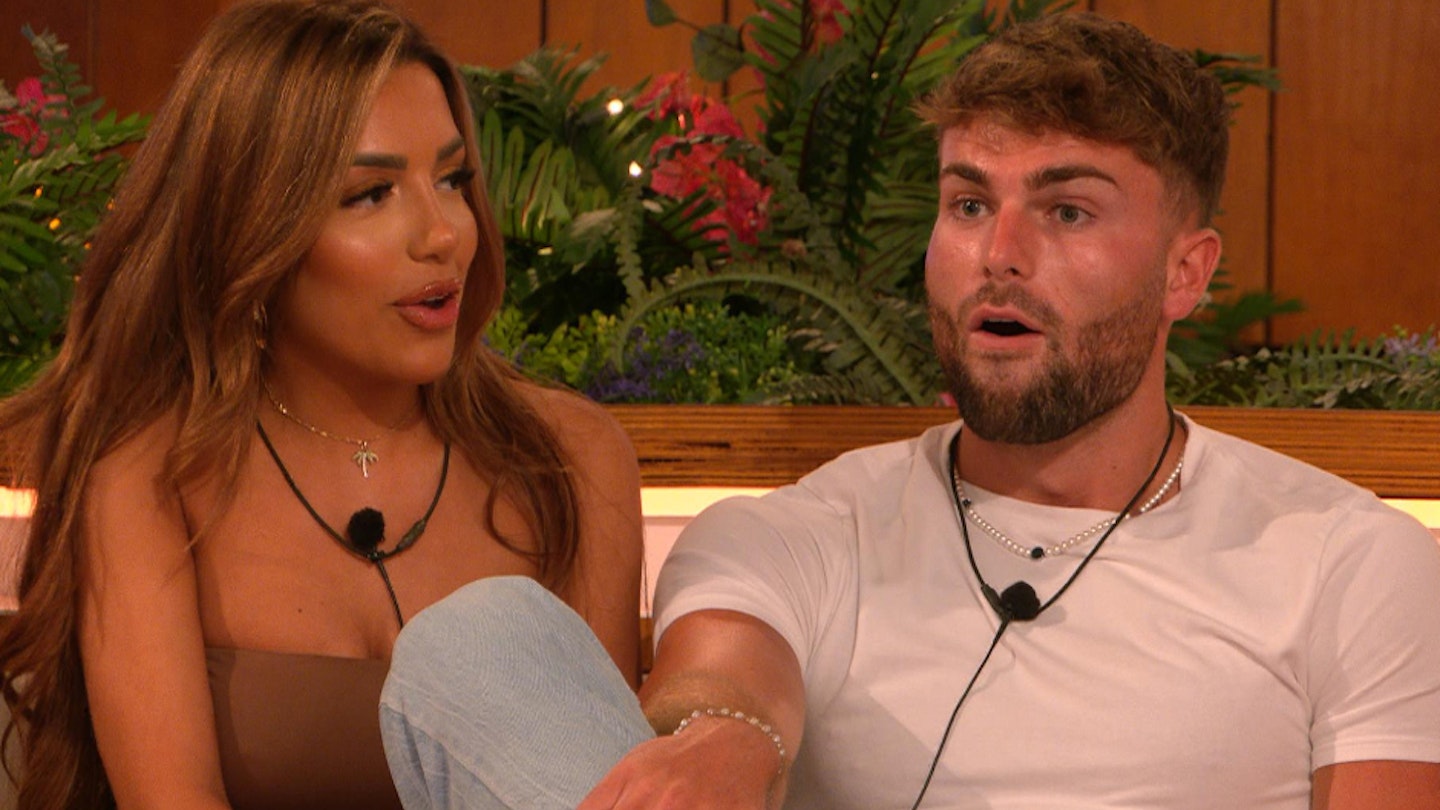 Tanyel Revan and Tom Clare looking shocked in the Love Island villa
