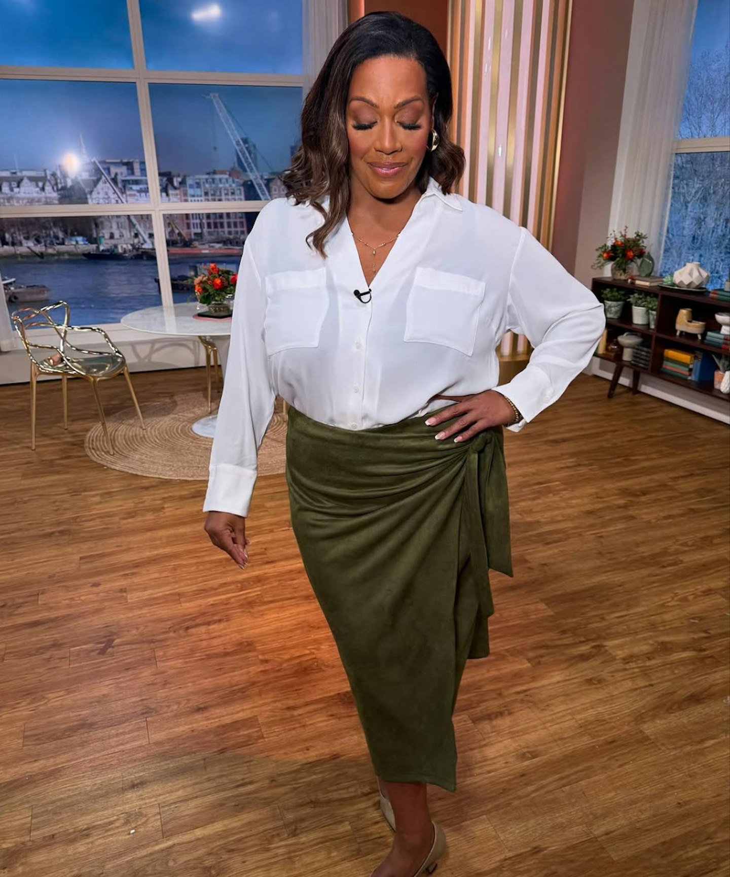 Alison Hammond in green skirt and white shirt