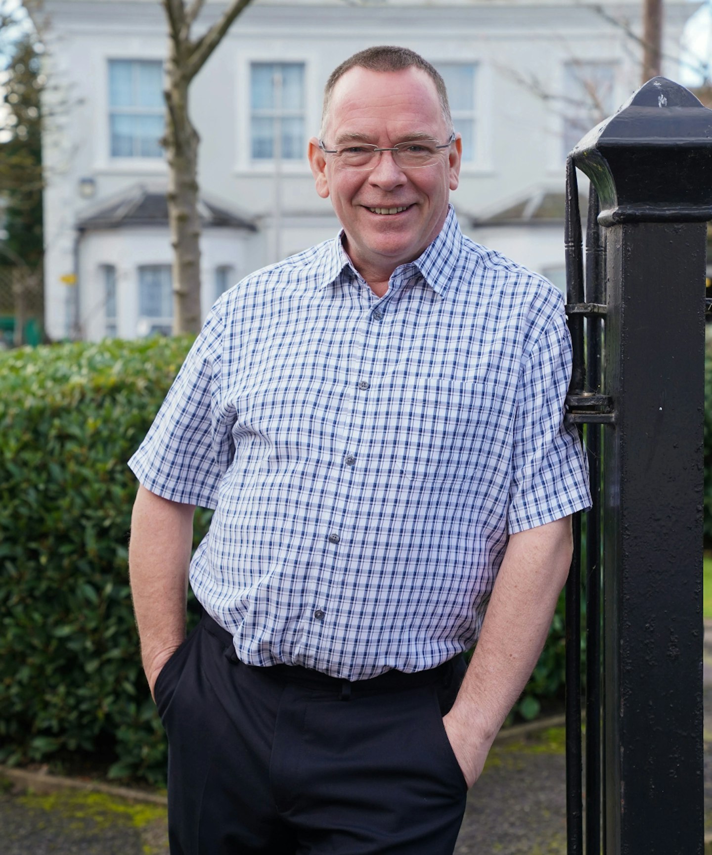 Ian Beale standing in Albert Square