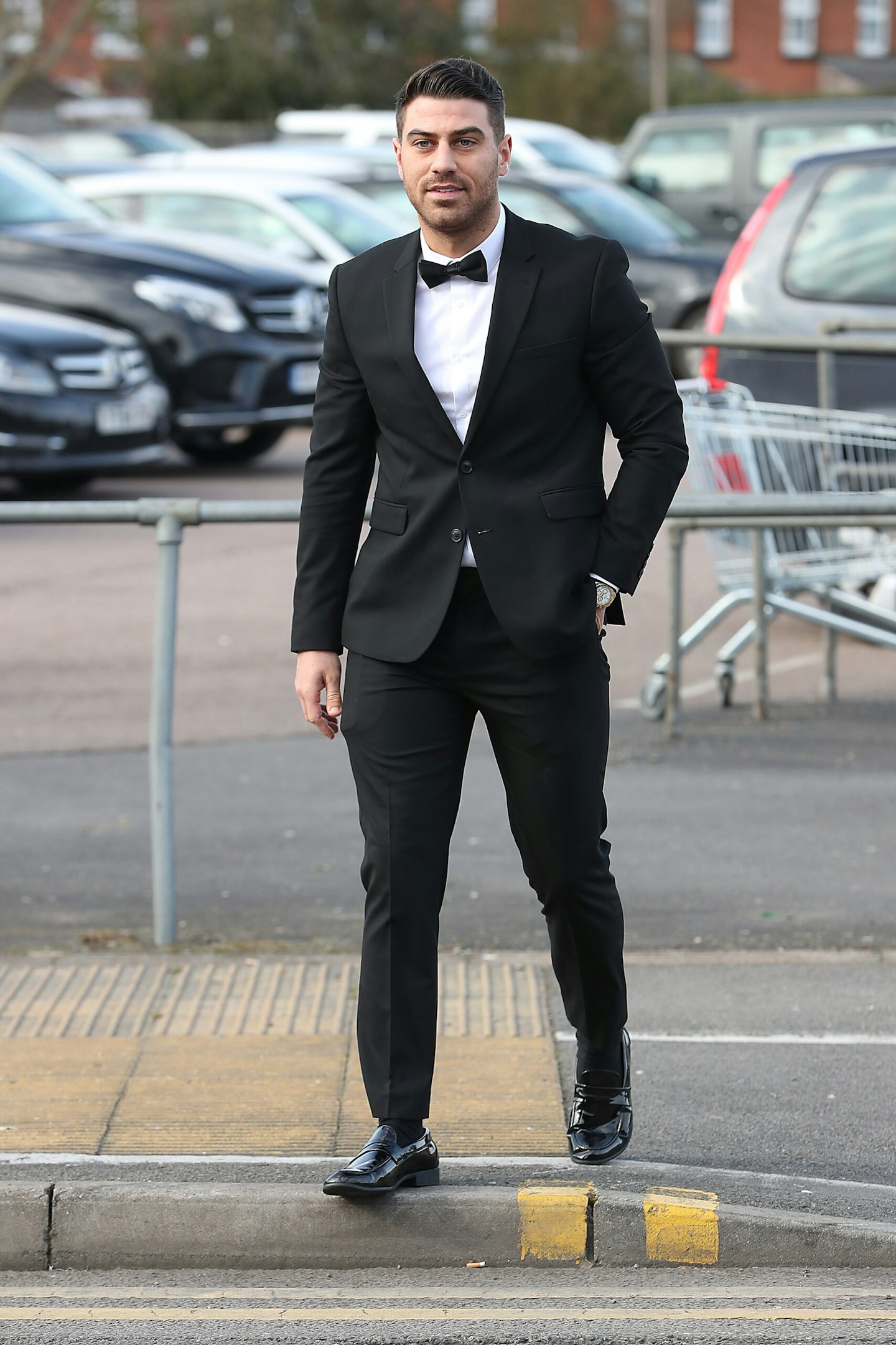 TOWIE's Jon Clark wearing a suit