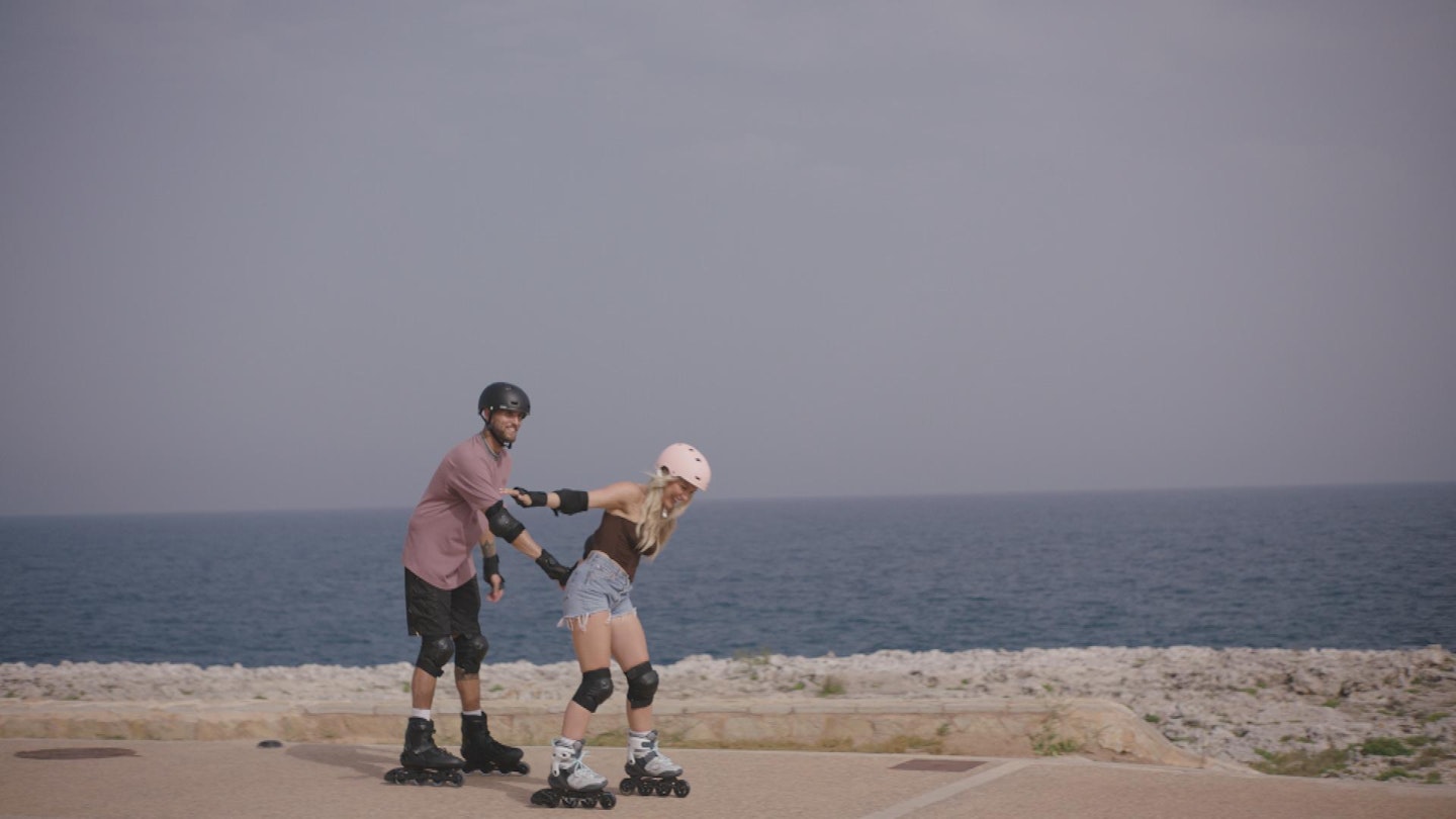 Molly and Zach roller skating on Love Island