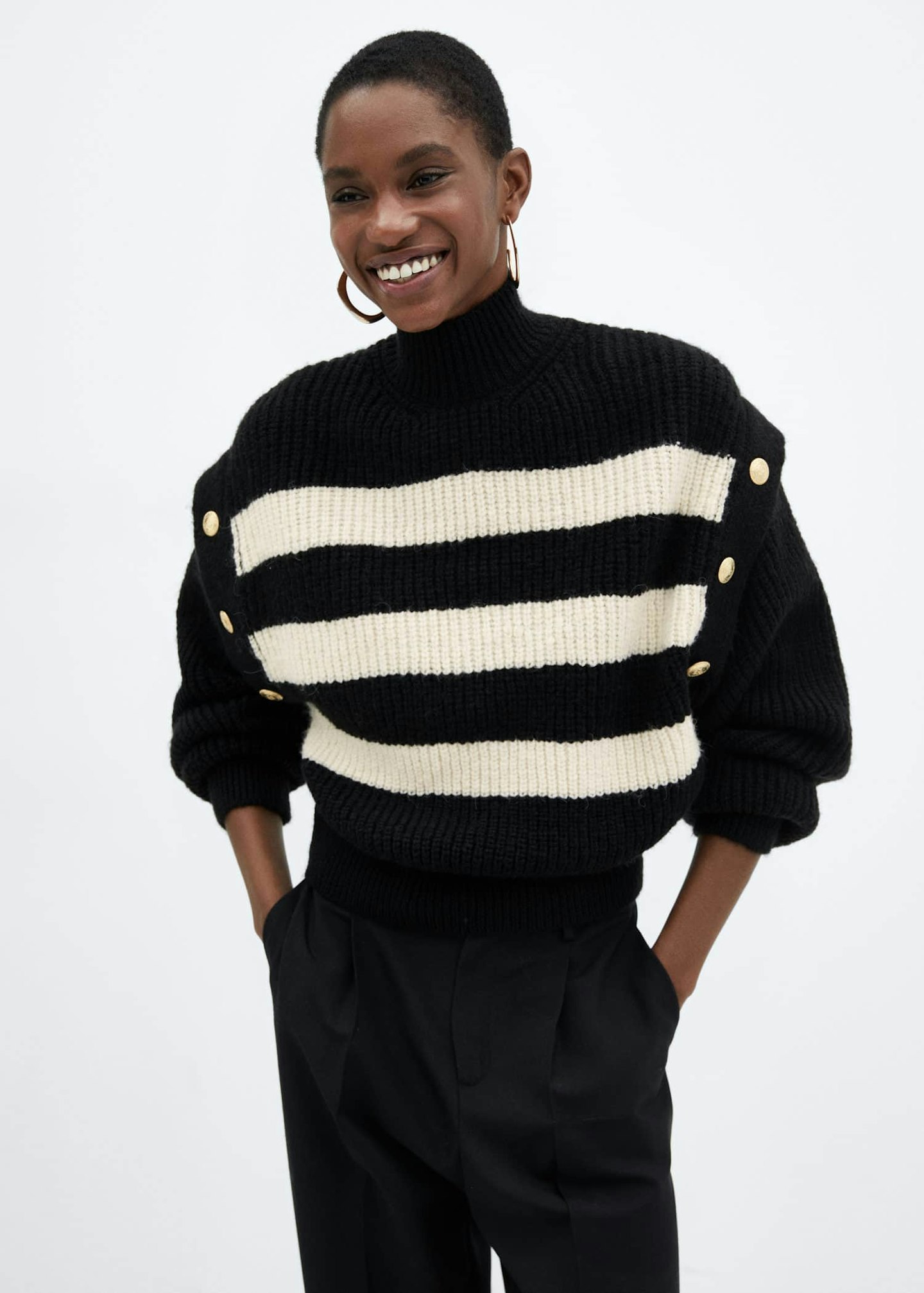 Woman wearing striped Mango jumper
