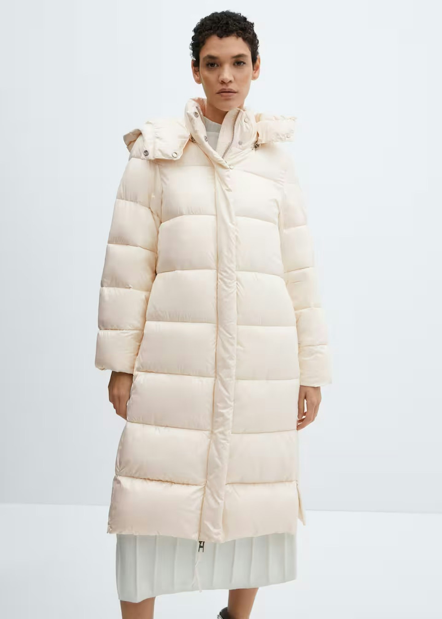 Model wearing cream longline puffer coat
