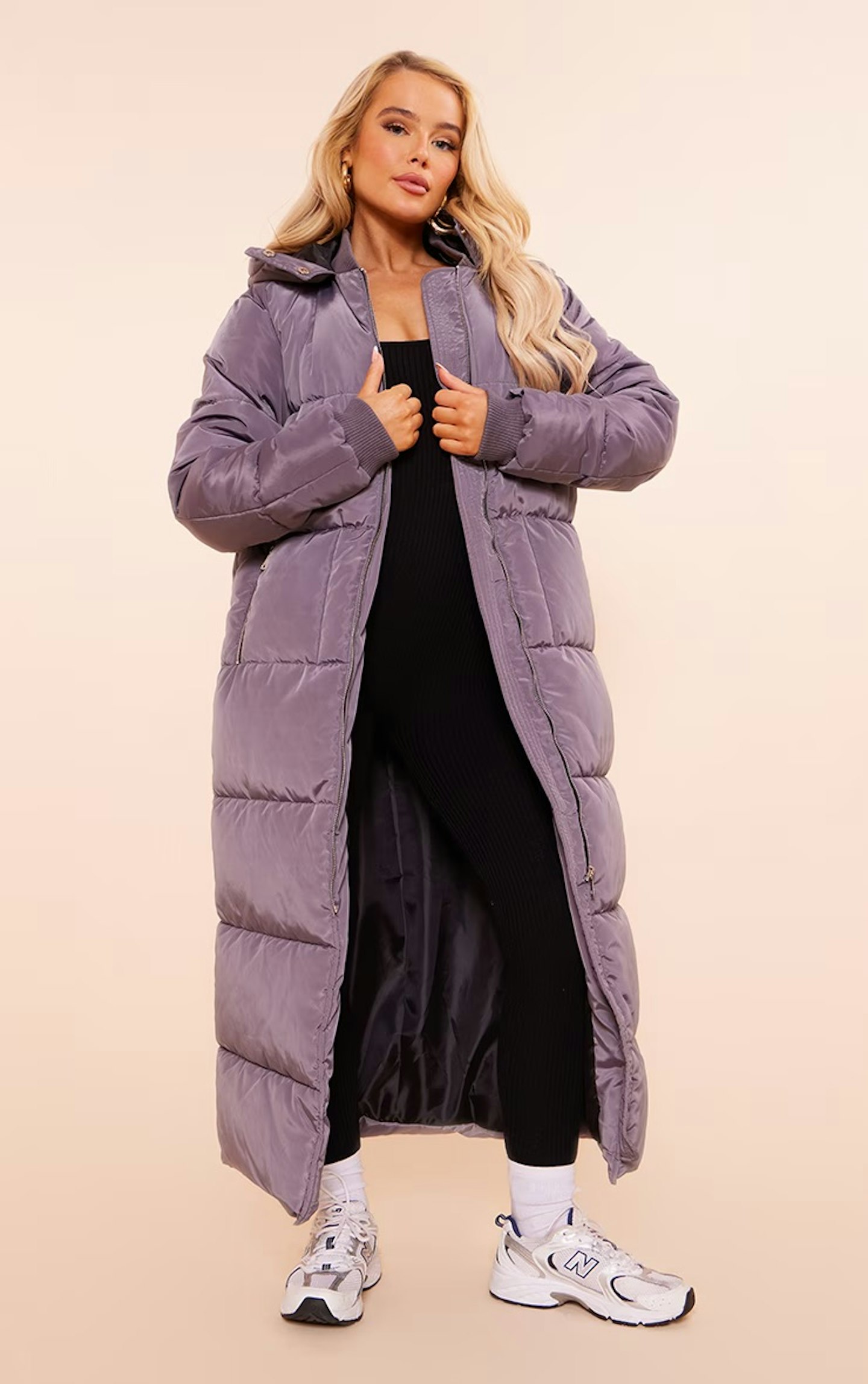 Model wearing grey longline puffer coat
