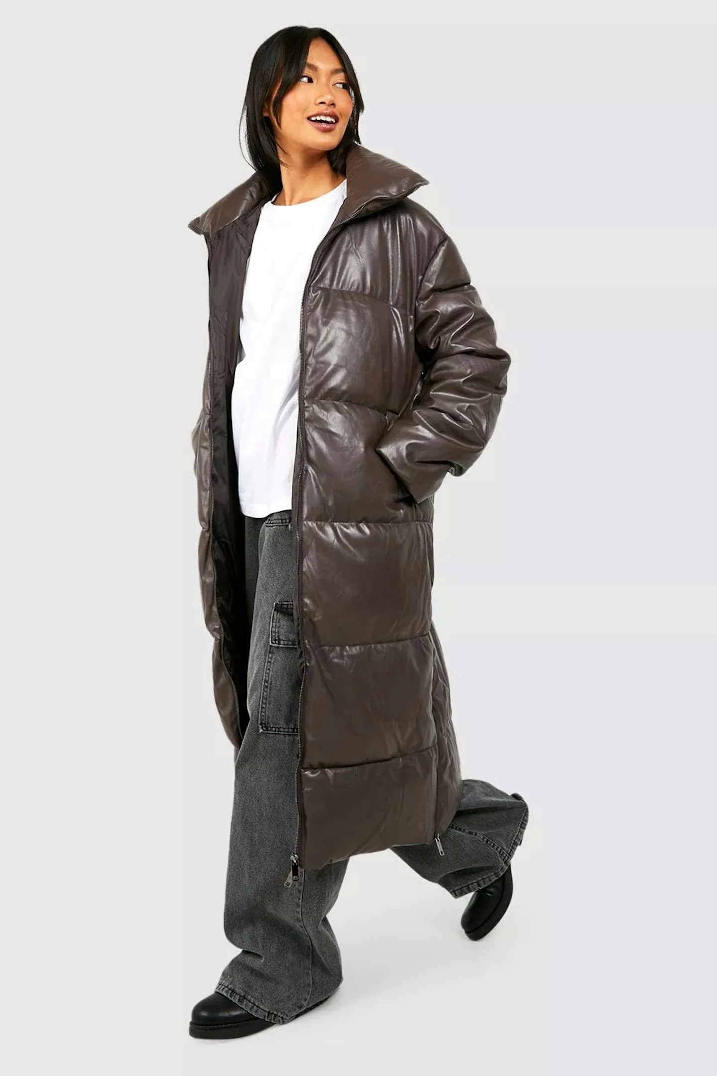 model wearing brown oversize longline puffer coat