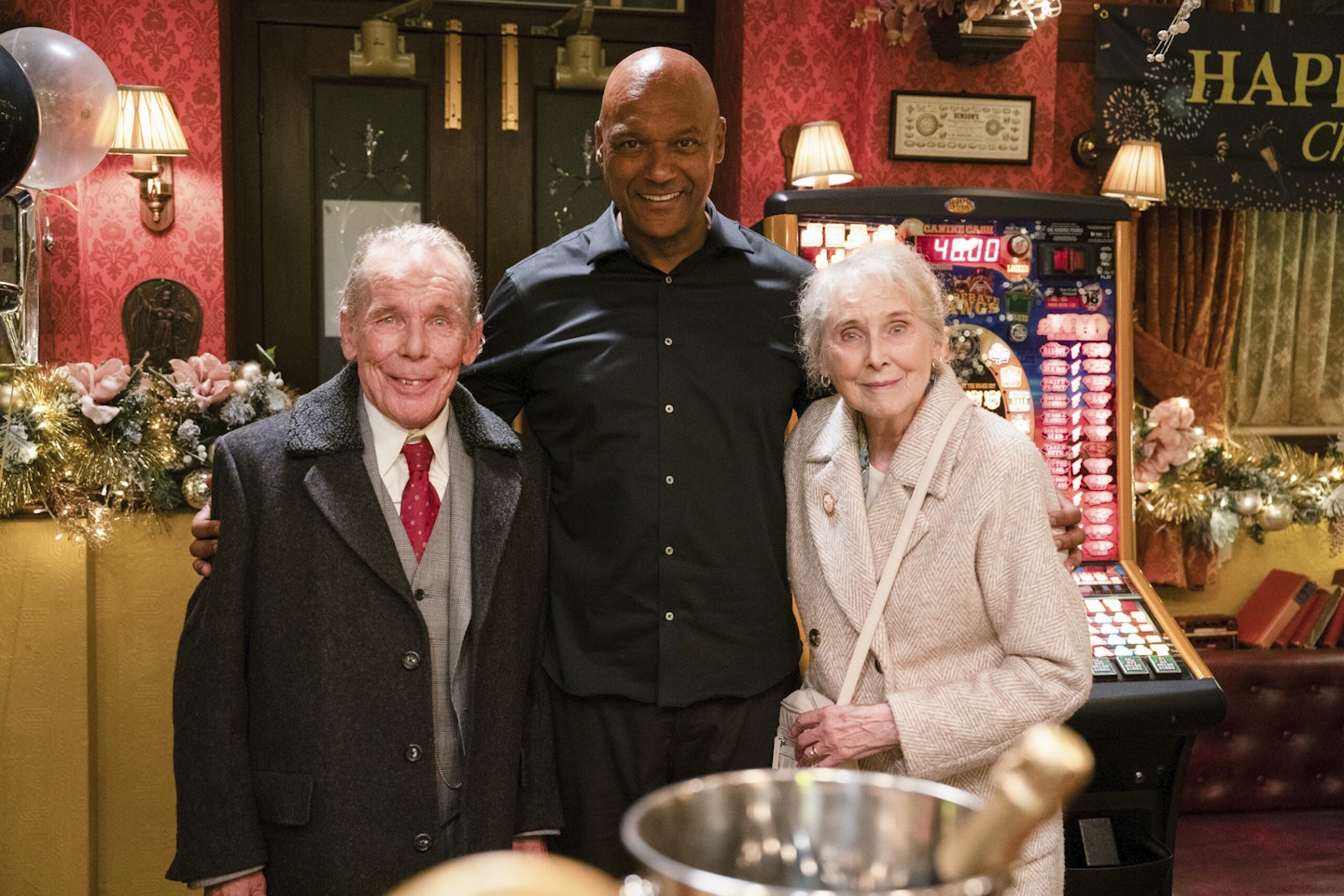 Christopher Fairbank as Eddie Knight, Colin Salmon as George Knight and Elizabeth Counsell as Gloria Knight in EastEnders