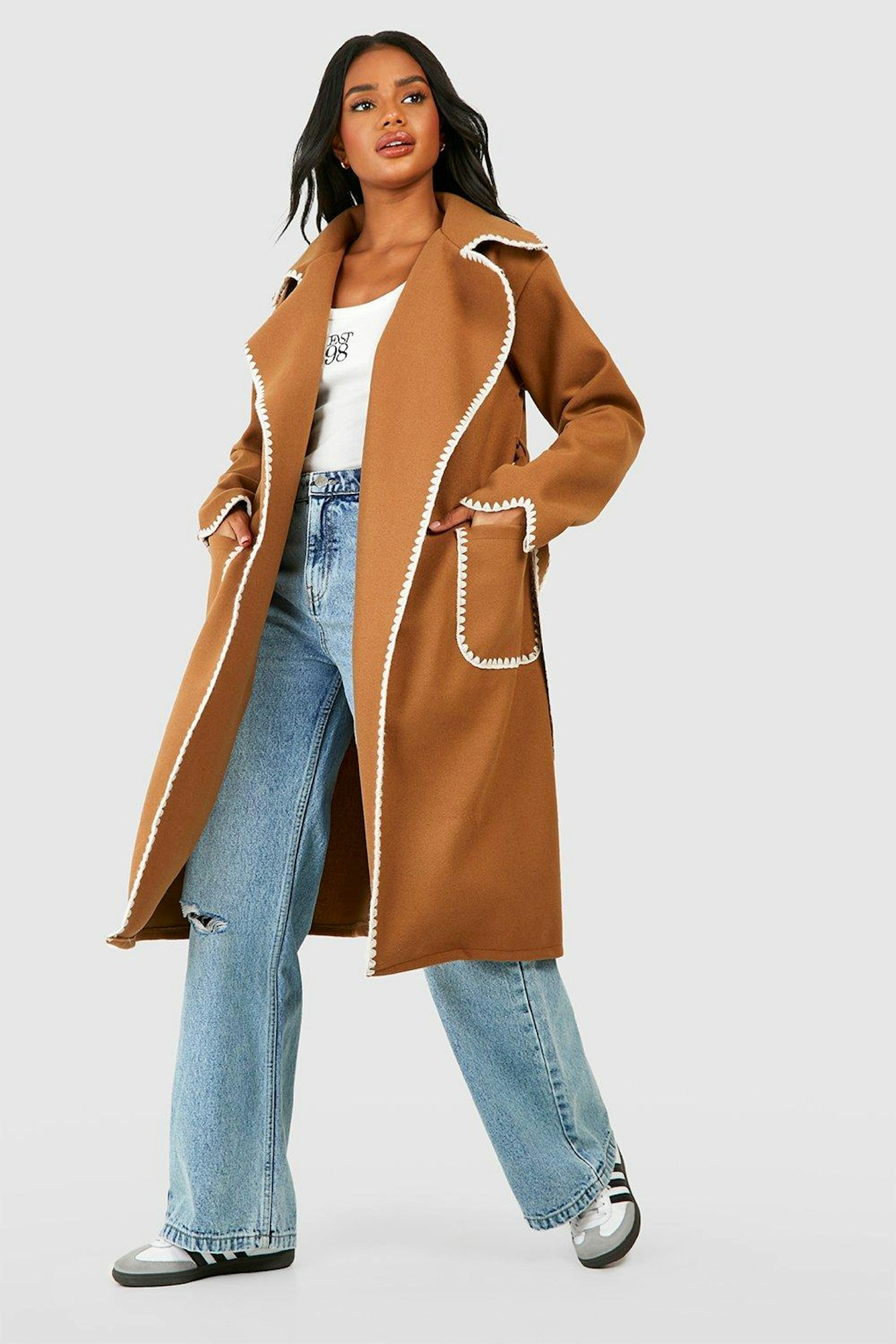 girl in camel coat