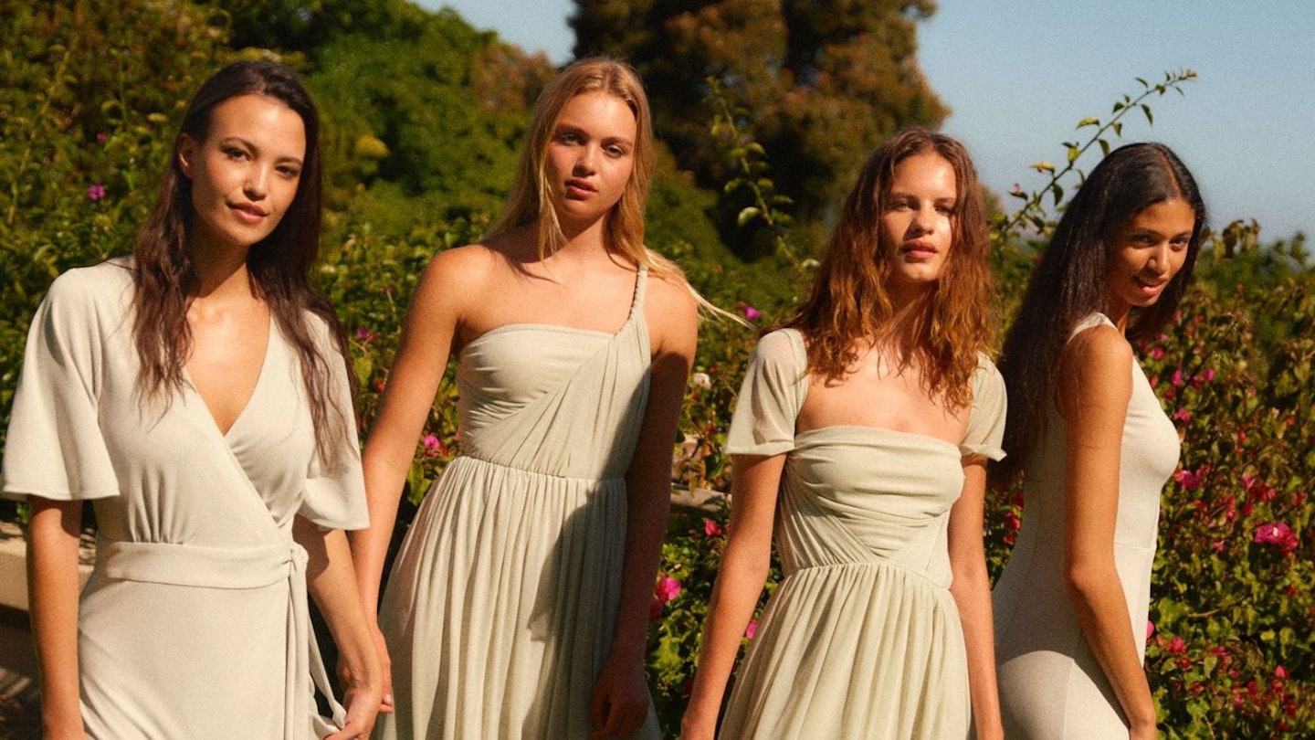 Four bridesmaids in sage green dresses