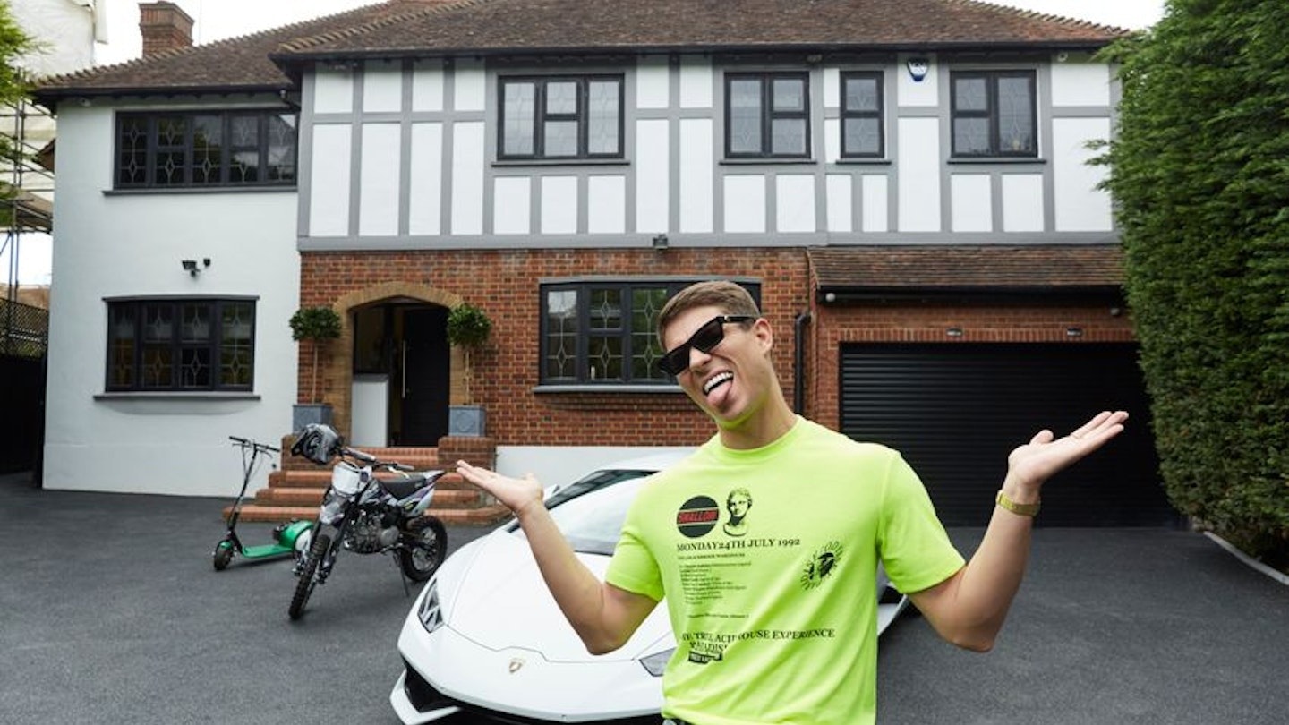 Joey Essex outside his house in Chigwell, Essex