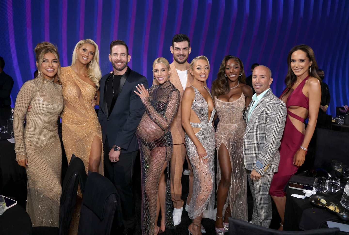 Chrishell Stause, Emma Hernan, Tarek El Moussa, Heather Rae El Moussa, Romain Bonnet, Mary Fitzgerald, Chelsea Lazkani, Jason Oppenheim and Davina Potratz on stage during the 2022 People's Choice Awards