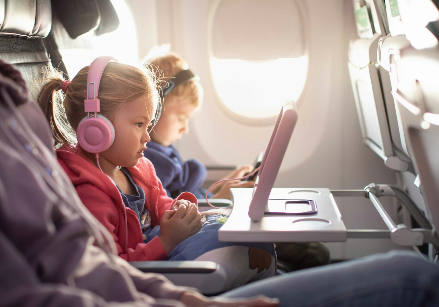 Child playing on a plane