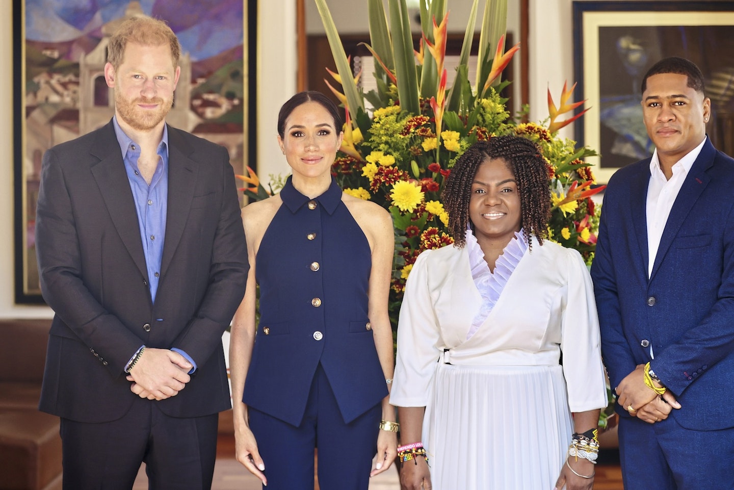 Prince Harry, Duke of Sussex (L) and Meghan, Duchess of Sussex (2nd L) are welcomed to Colombia by Vice President Francia Márquez and her husband Yerney Pinillo at her official residence