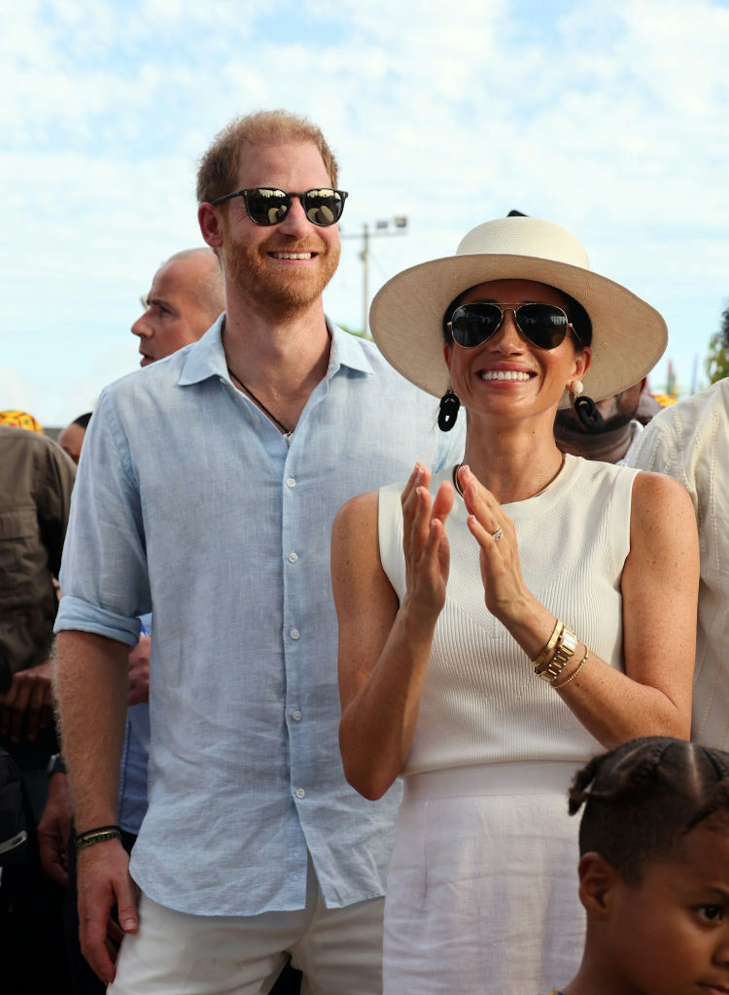 Harry and Meghan smiling