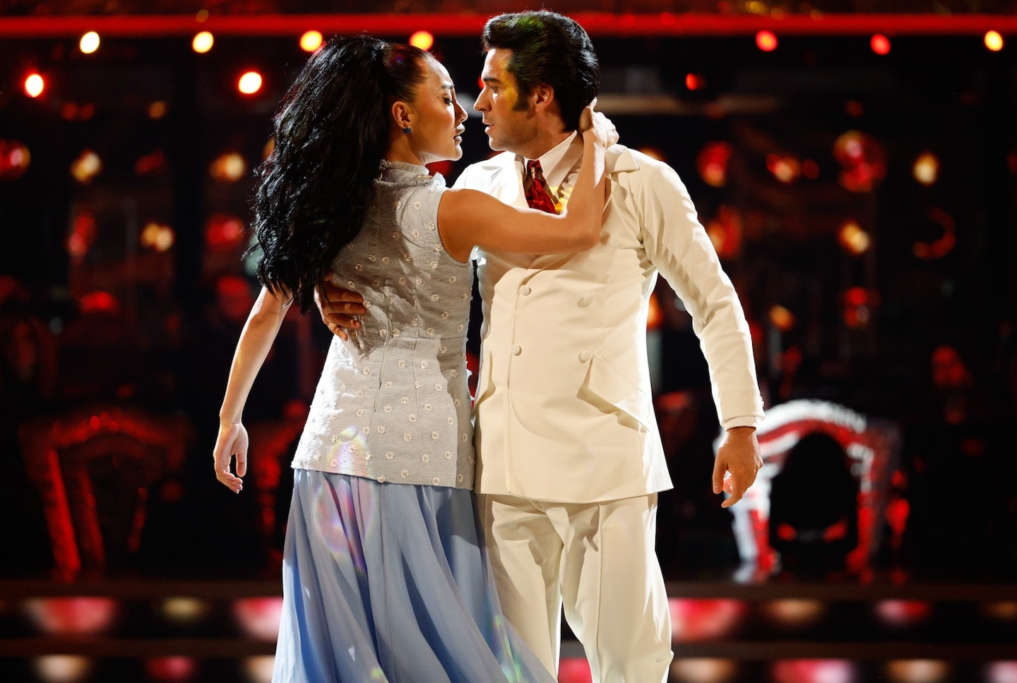 Shayne Ward and Nancy Xu dancing on Strictly Come Dancing, dressed as Elvis and Priscilla Presley