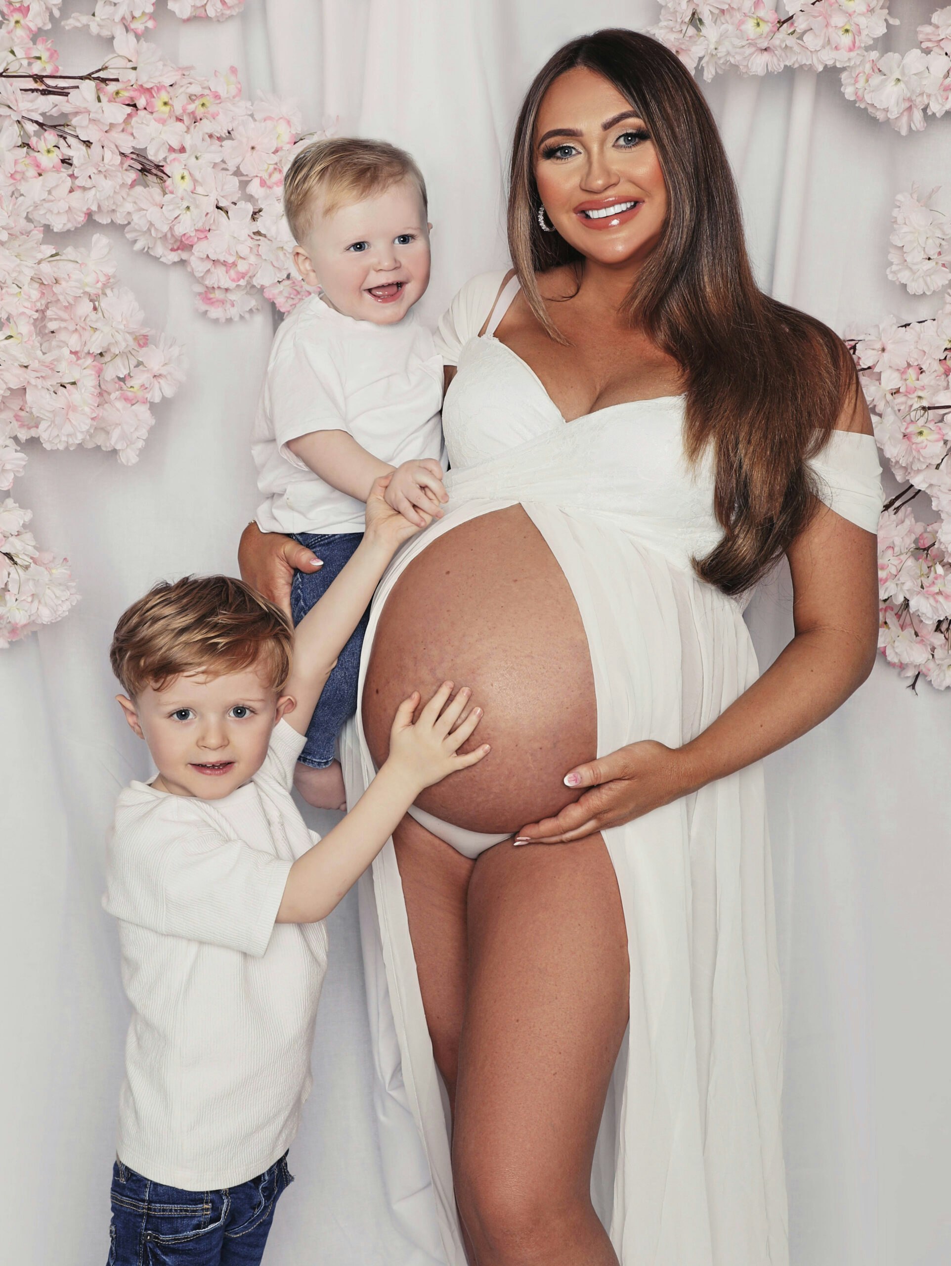 charlotte dawson poses with her young sons