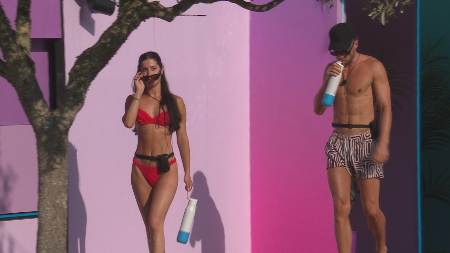 Yasmin and Harry leaving the Hideaway