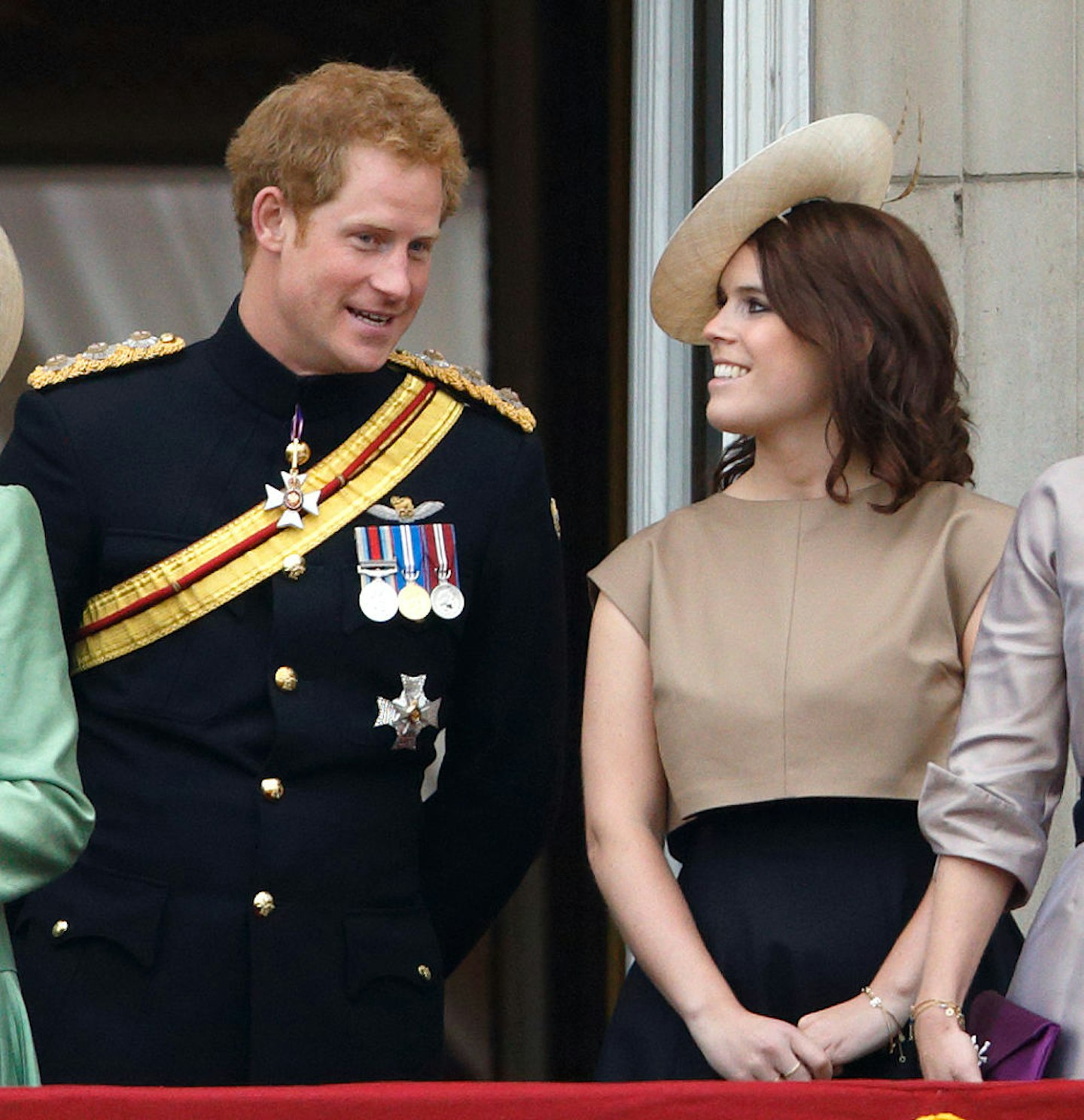 Prince Harry and Princess Eugenie stand on the balcony of Buckingham Palace during Trooping the Colour on June 13, 2015 in London, England