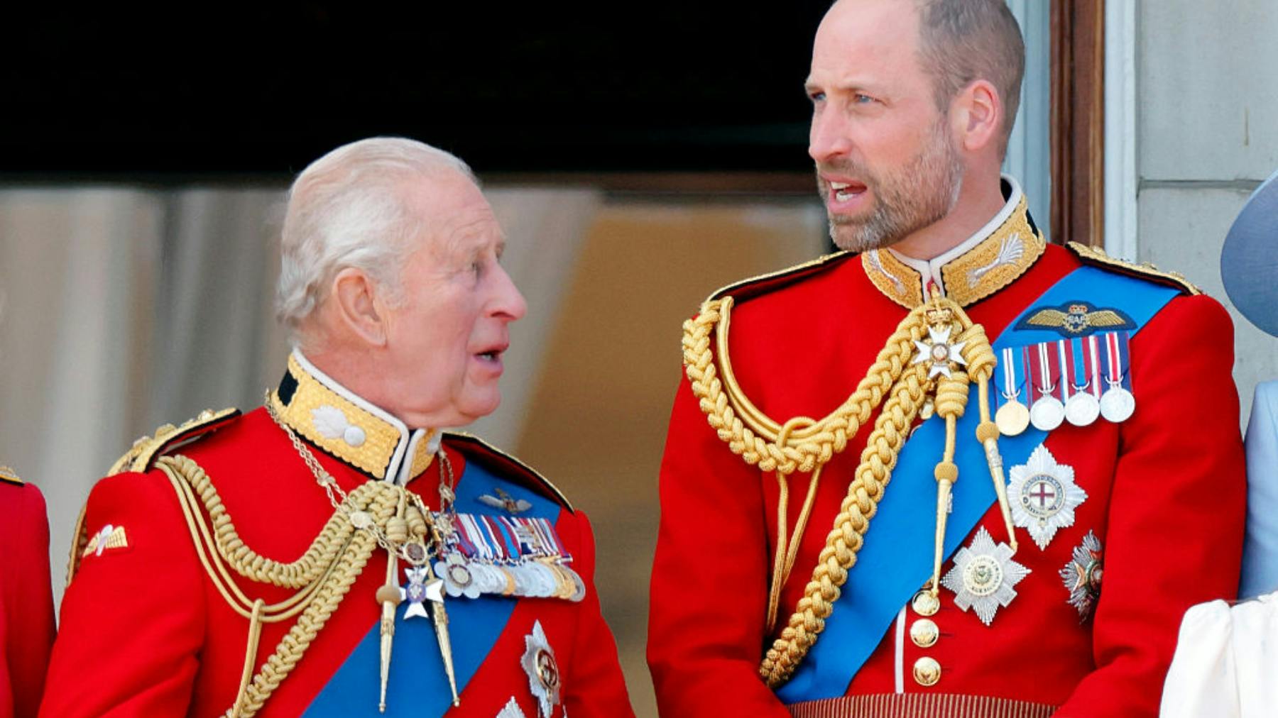 King Charles III (Colonel-in-Chief of the Grenadier Guards) and Prince William, Prince of Wales (Colonel of the Welsh Guards) watch an RAF flypast from the balcony of Buckingham Palace after attending Trooping The Colour 2026 on June 13, 2026 in London, England.