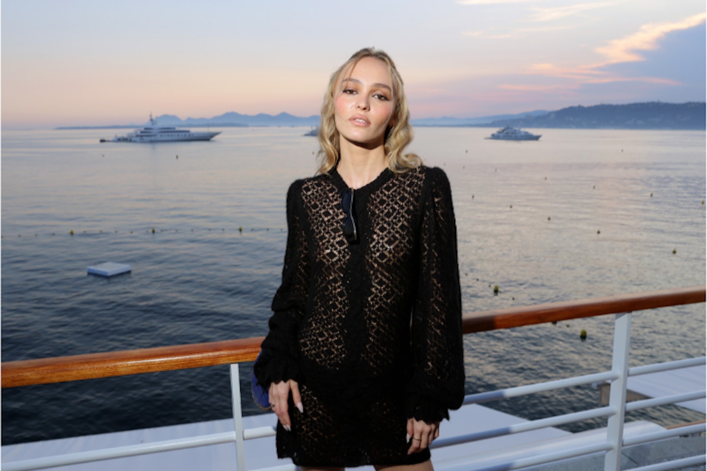 Lily-Rose Depp Wearing a Chanel Set at Cannes 2016