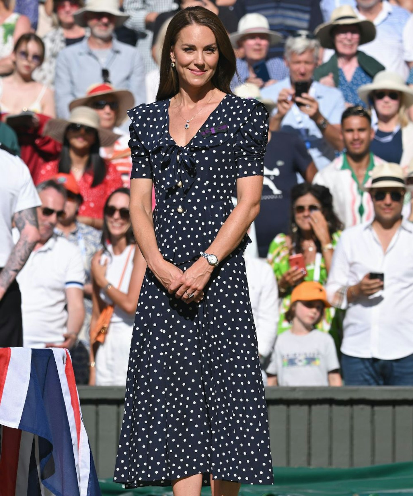 Kate Middleton wearing a navy polka dot dress