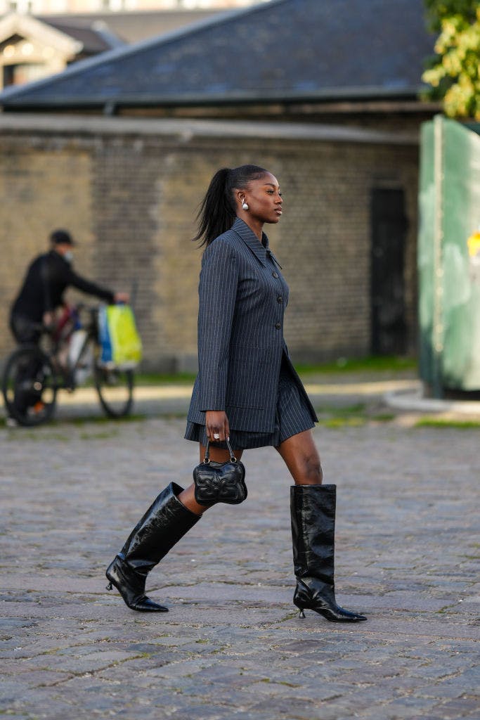 Women wearing store knee high boots