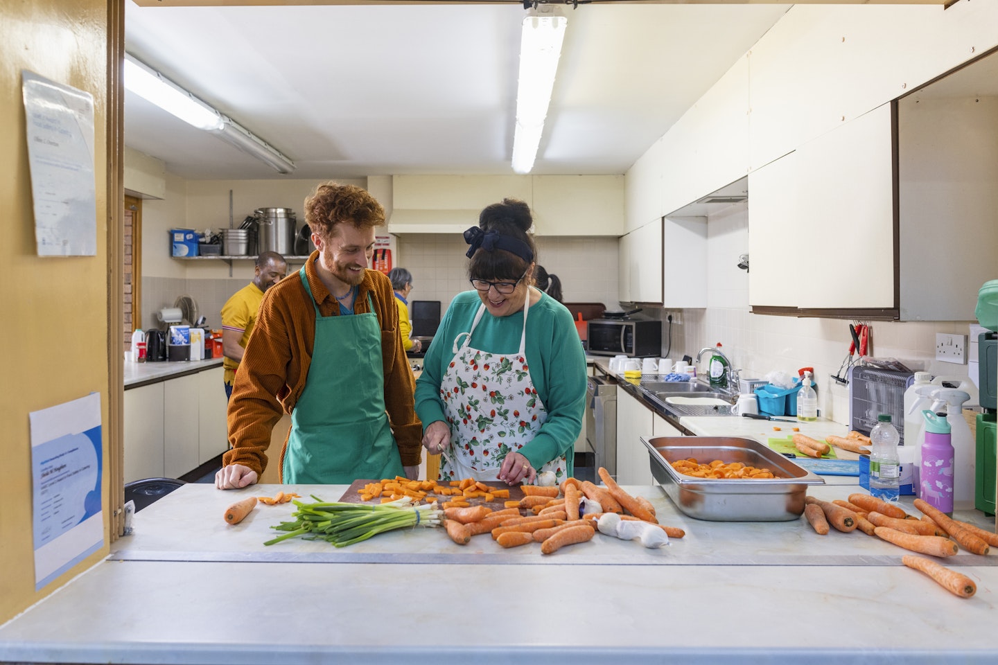 Preparing food in a soup kitchen