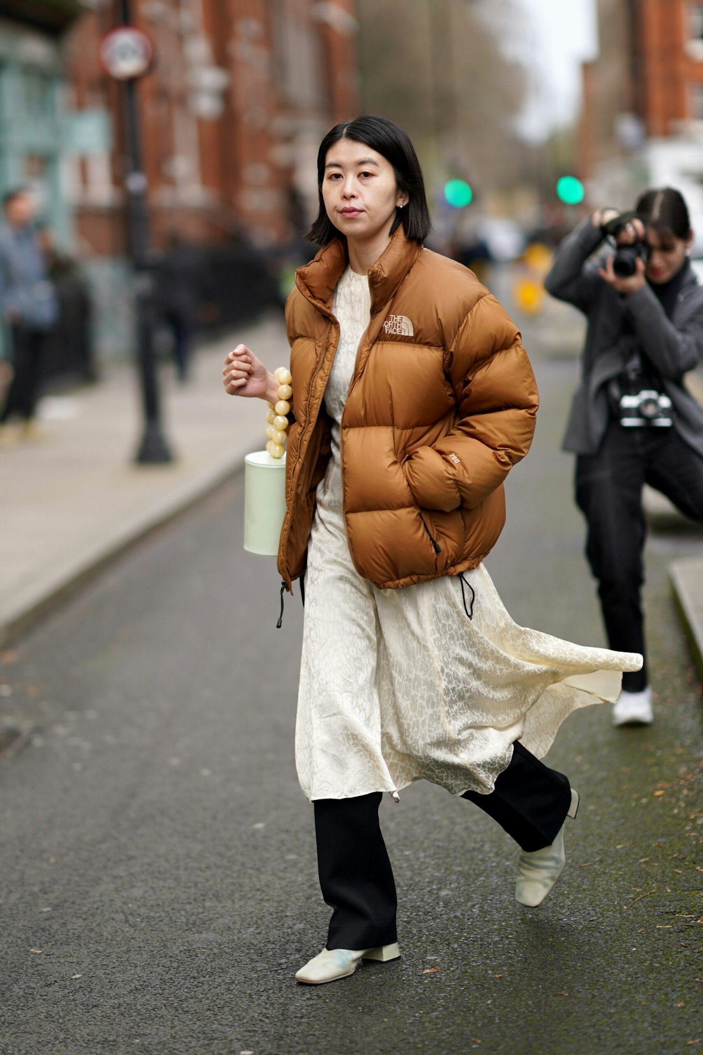 Street style wearing The North Face jacket