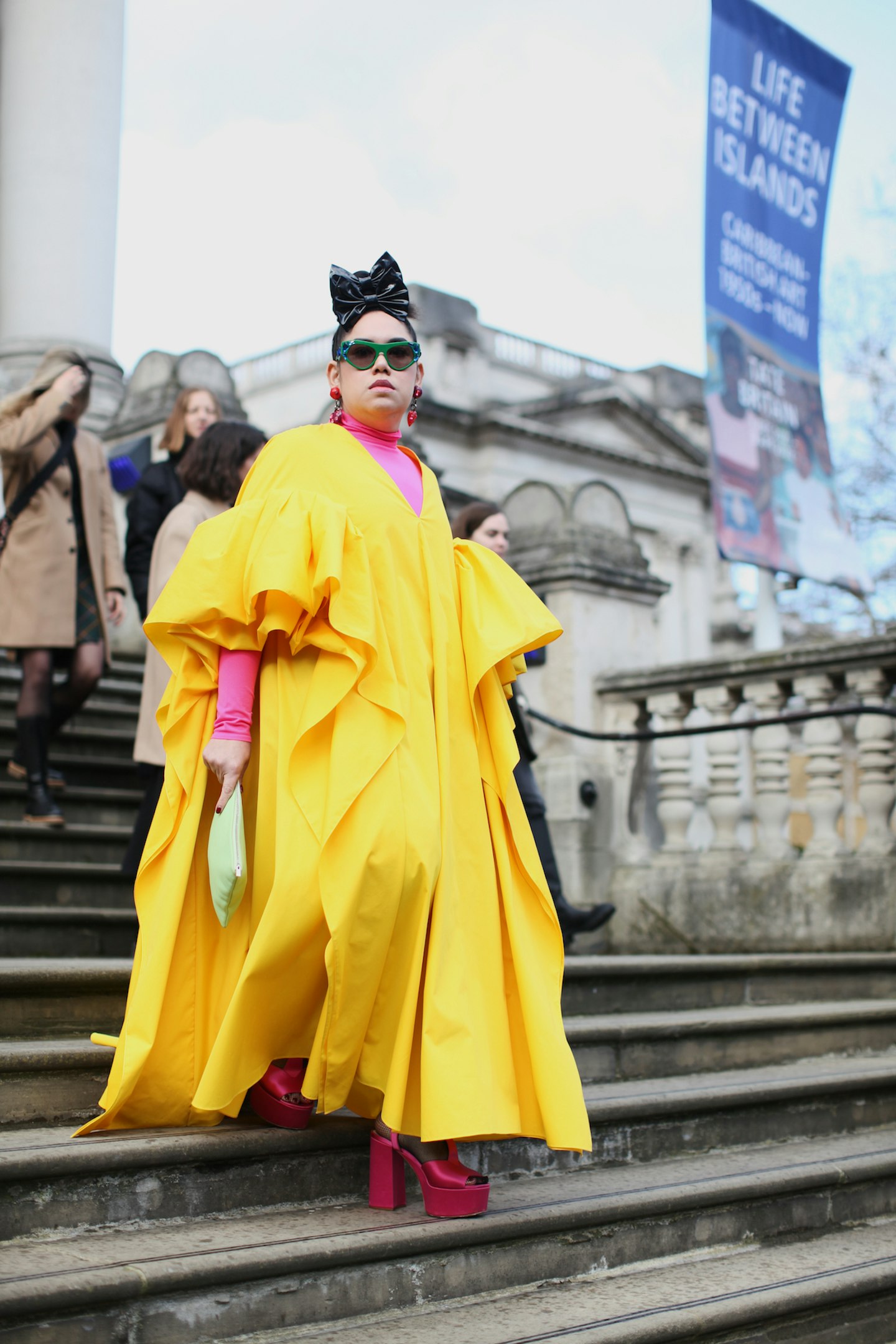 Street style wearing yellow dress