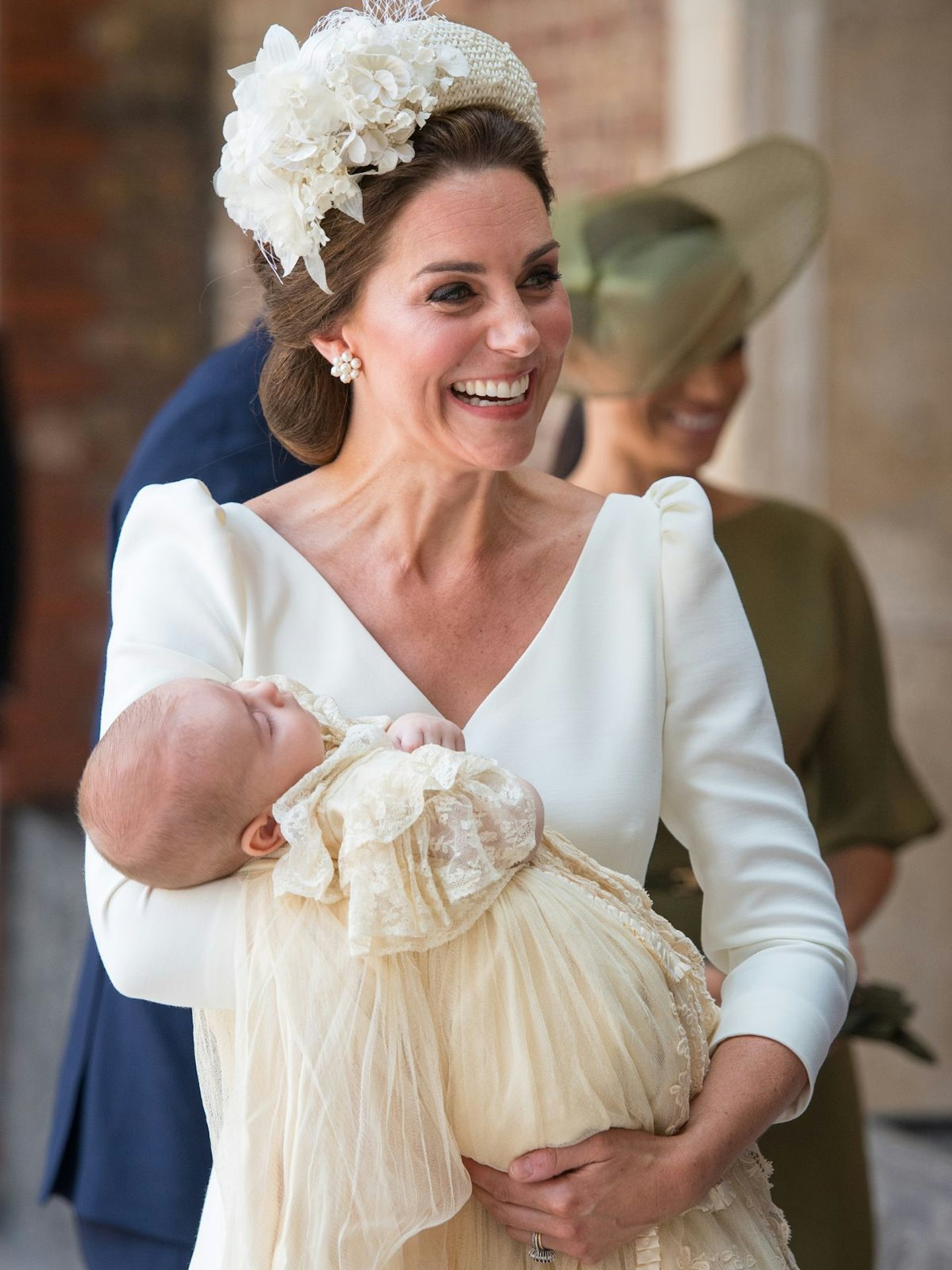 Kate Middleton carries Prince Louis as they arrive for his christening service at St James's Palace - Getty Images
