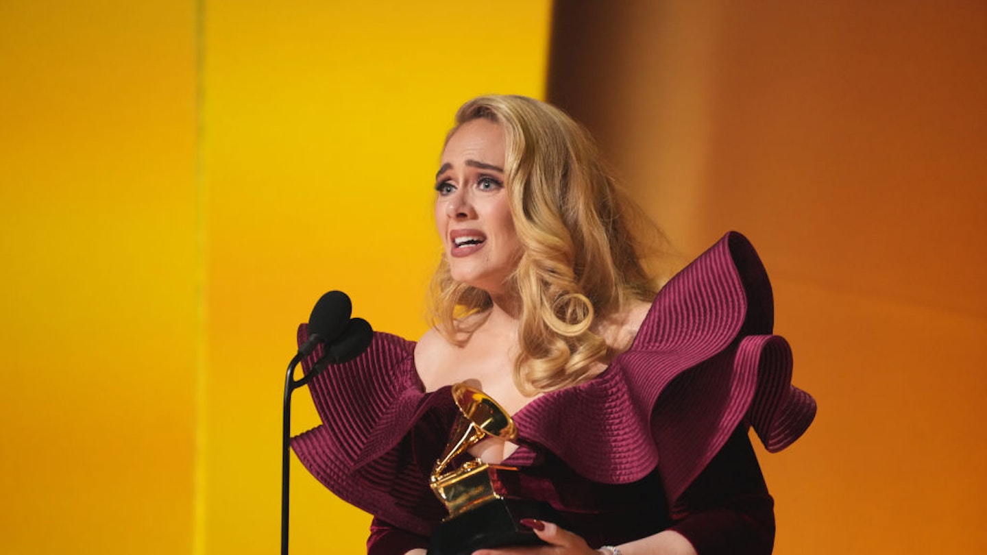 Adele crying getting an award