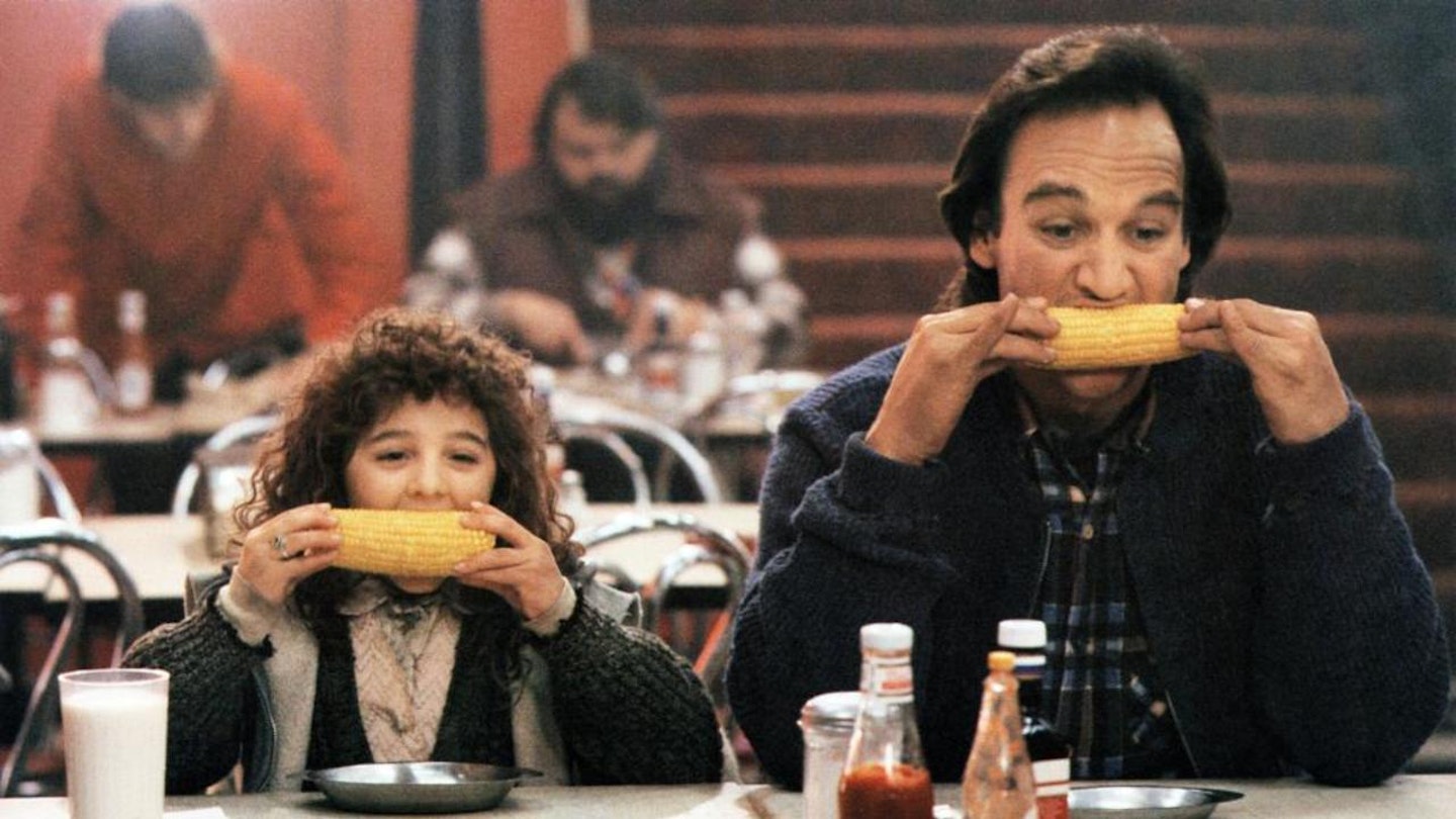 Curly and James eating corn