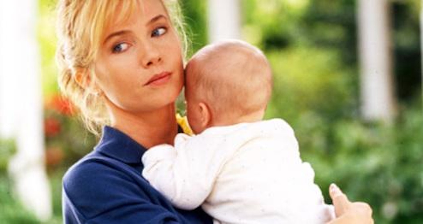 woman holding baby 