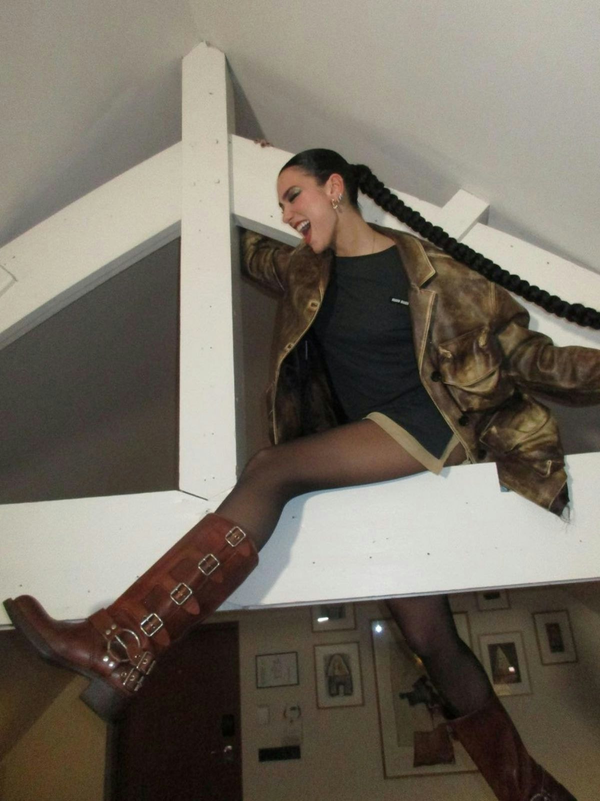 dualipa wearing the Miu Miu boots on Instagram