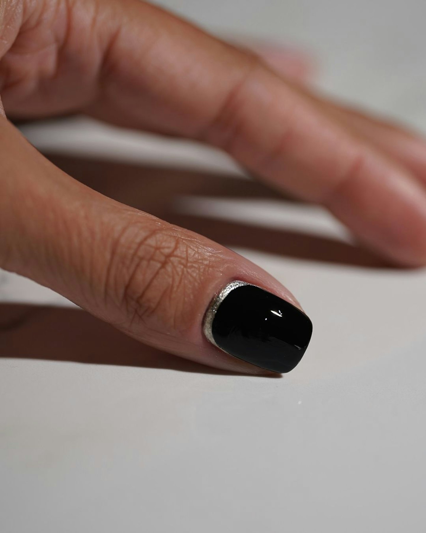 black nail design-silver glitter