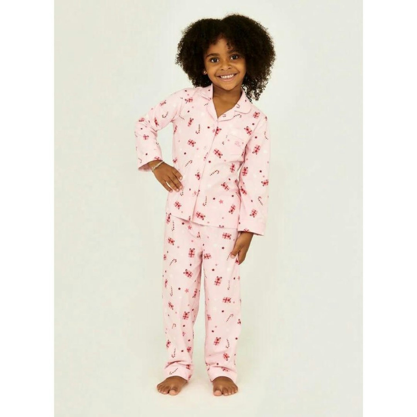 Family Christmas Pyjamas: Kids fleece present pyjamas in a bag - Pink Mix